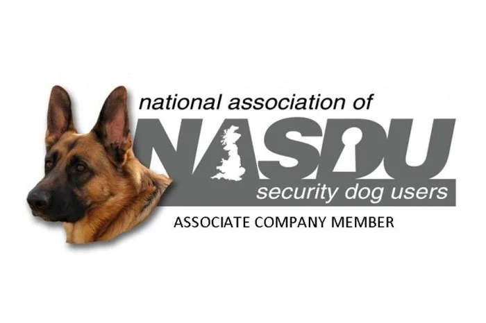 A logo with the text 'national association of NASDU security dog users' and a German shepherd dog image, indicating membership as an associate company.