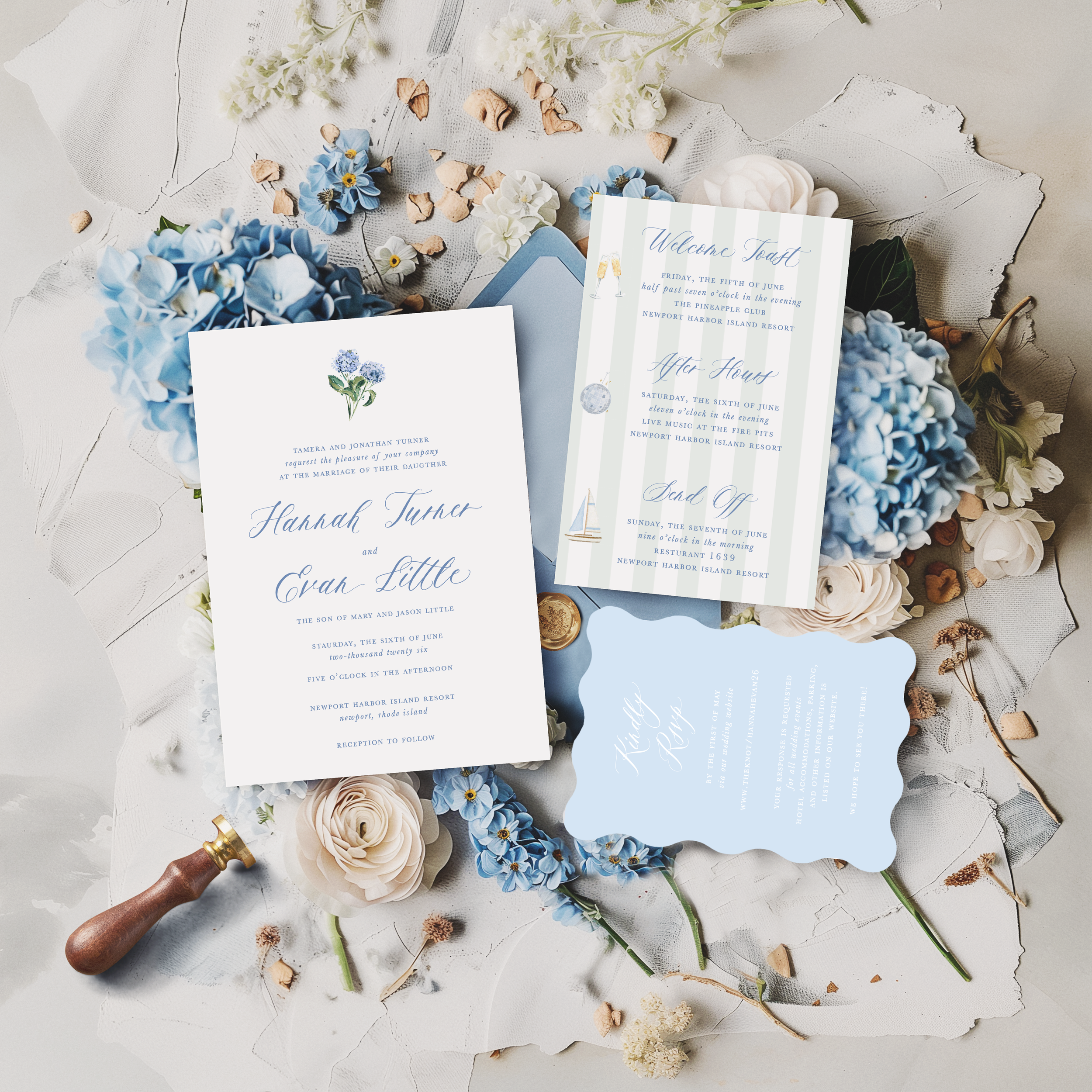 Wedding invitation suite with light blue, white, and striped details card, surrounded by blue hydrangeas, white ranunculus, small white flowers, dried leaves, a wax seal stamp, and scattered flower petals on a textured surface. Die cut, wavy. 
