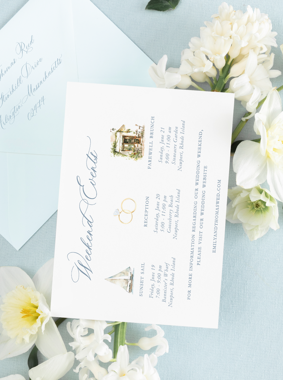 Wedding invitation card with details of events, watercolor illustrations, surrounded by white flowers on a light blue background.