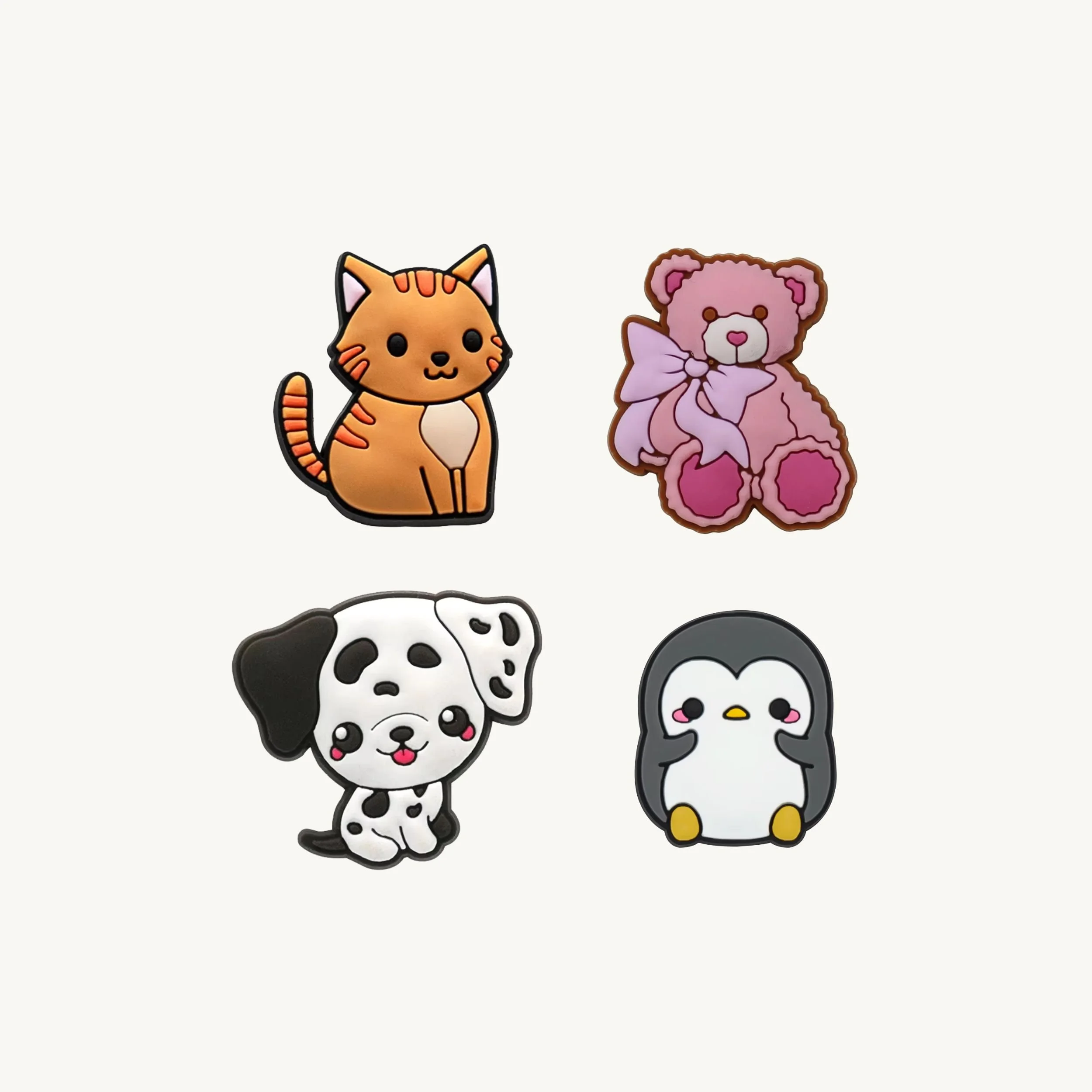 Cute tabby cat, teddy bear, dalmatian puppy, and penguin 4-pack charm set by CharmyKidz for customizable hair accessories