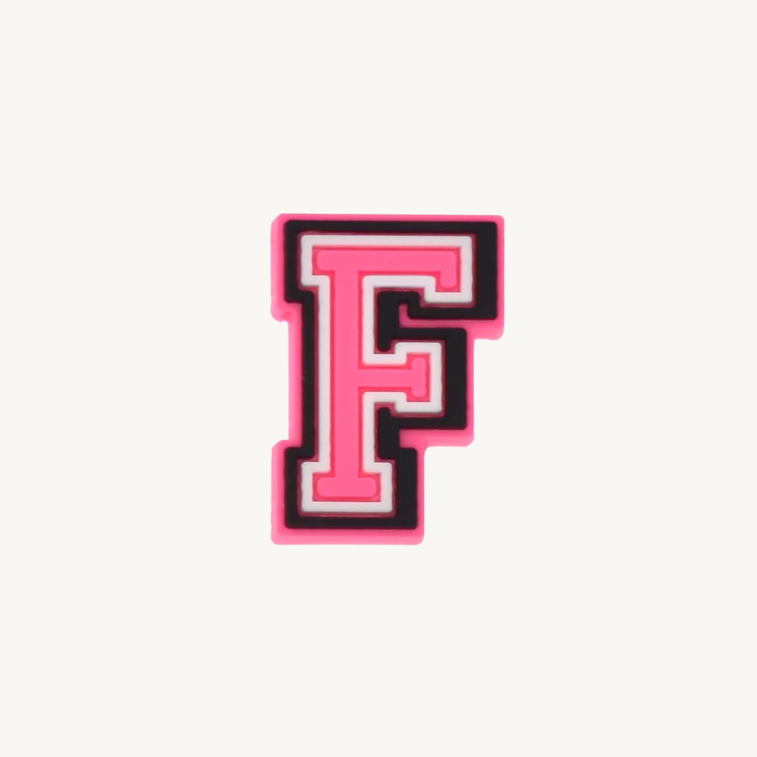 Pink varsity initial letter F charm by CharmyKidz for customizable hair accessories