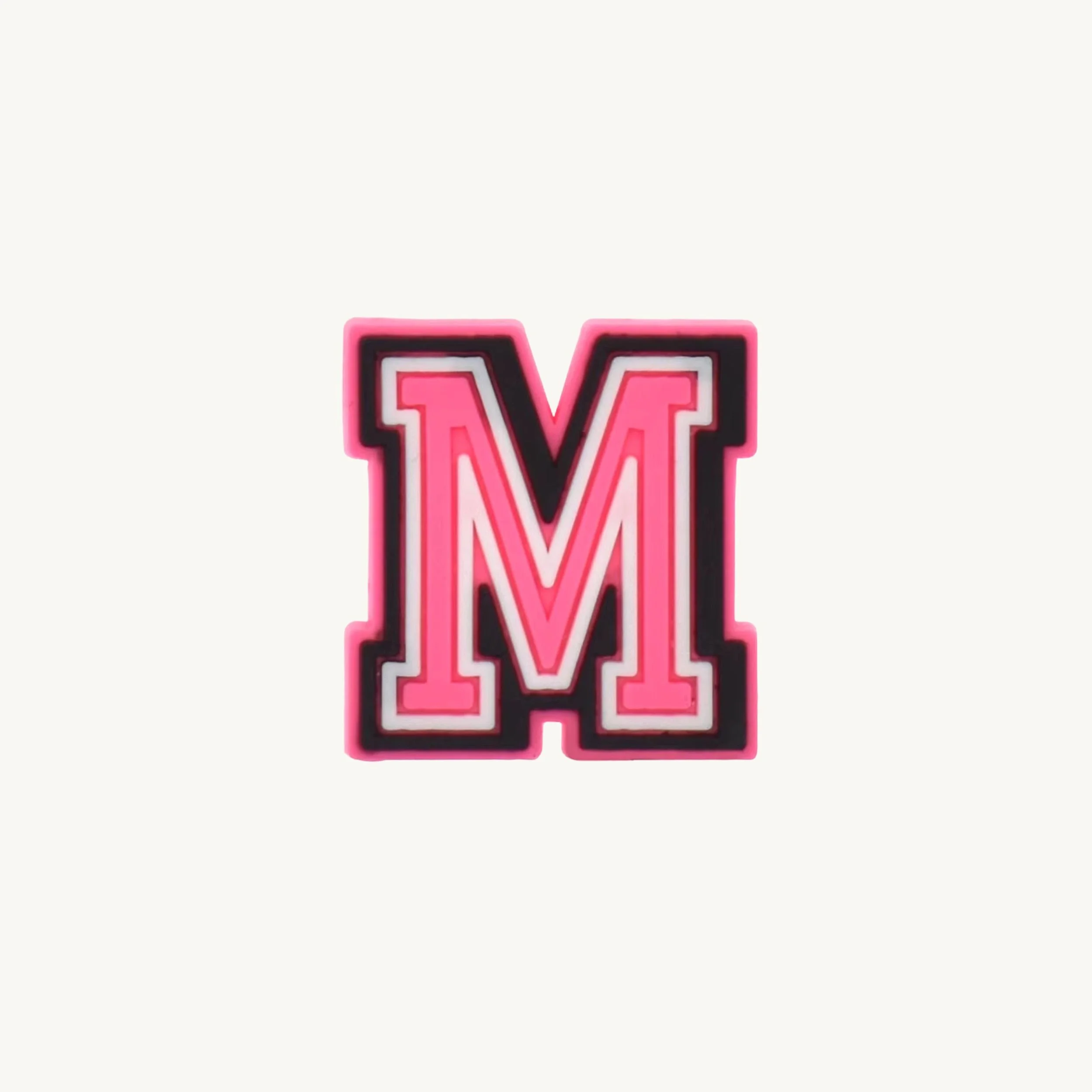 Pink varsity initial letter M charm by CharmyKidz for customizable hair accessories