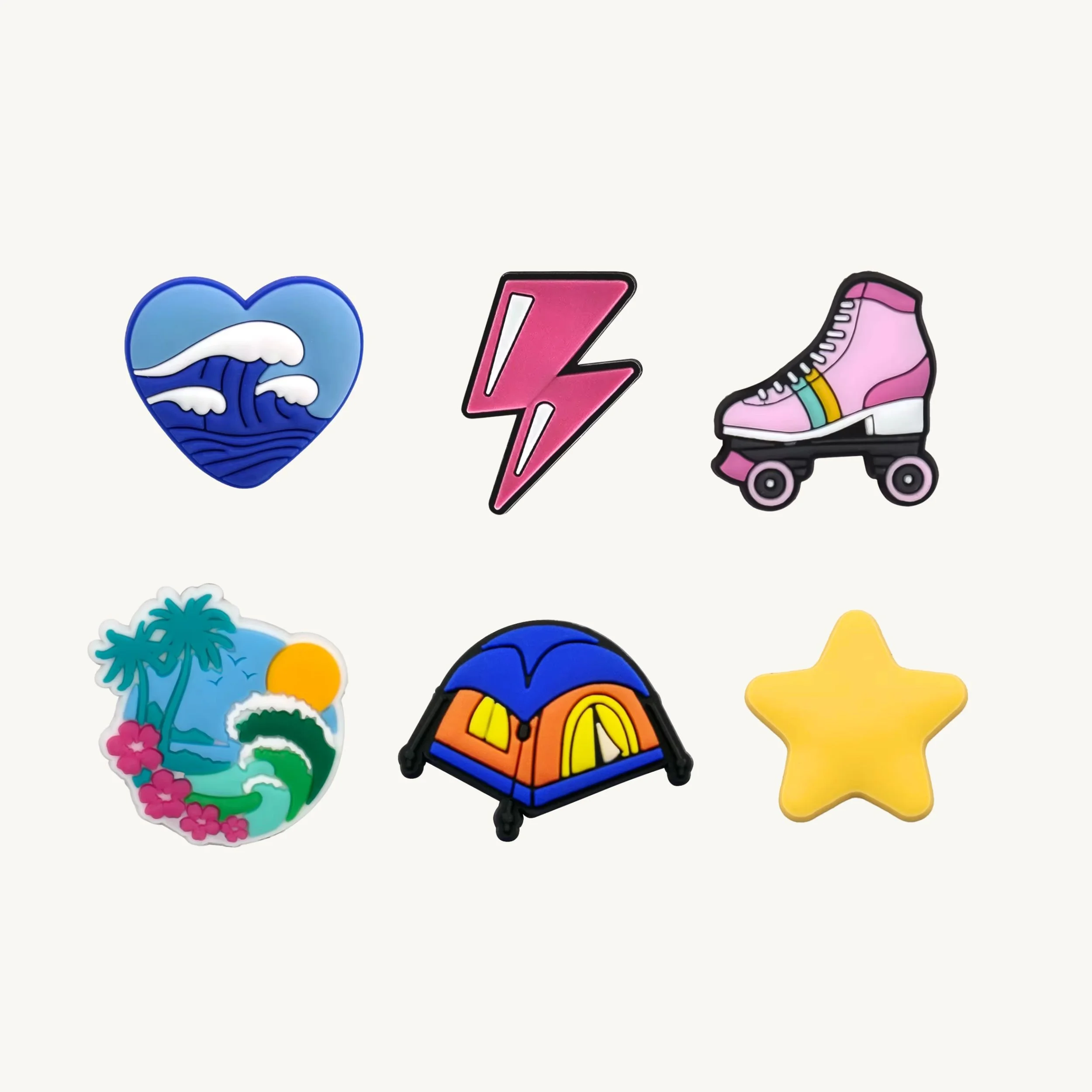 Ocean heart, lightning bolt, roller skate, beach waves, camping tent, and star 6-pack charm set by CharmyKidz for customizable hair accessories