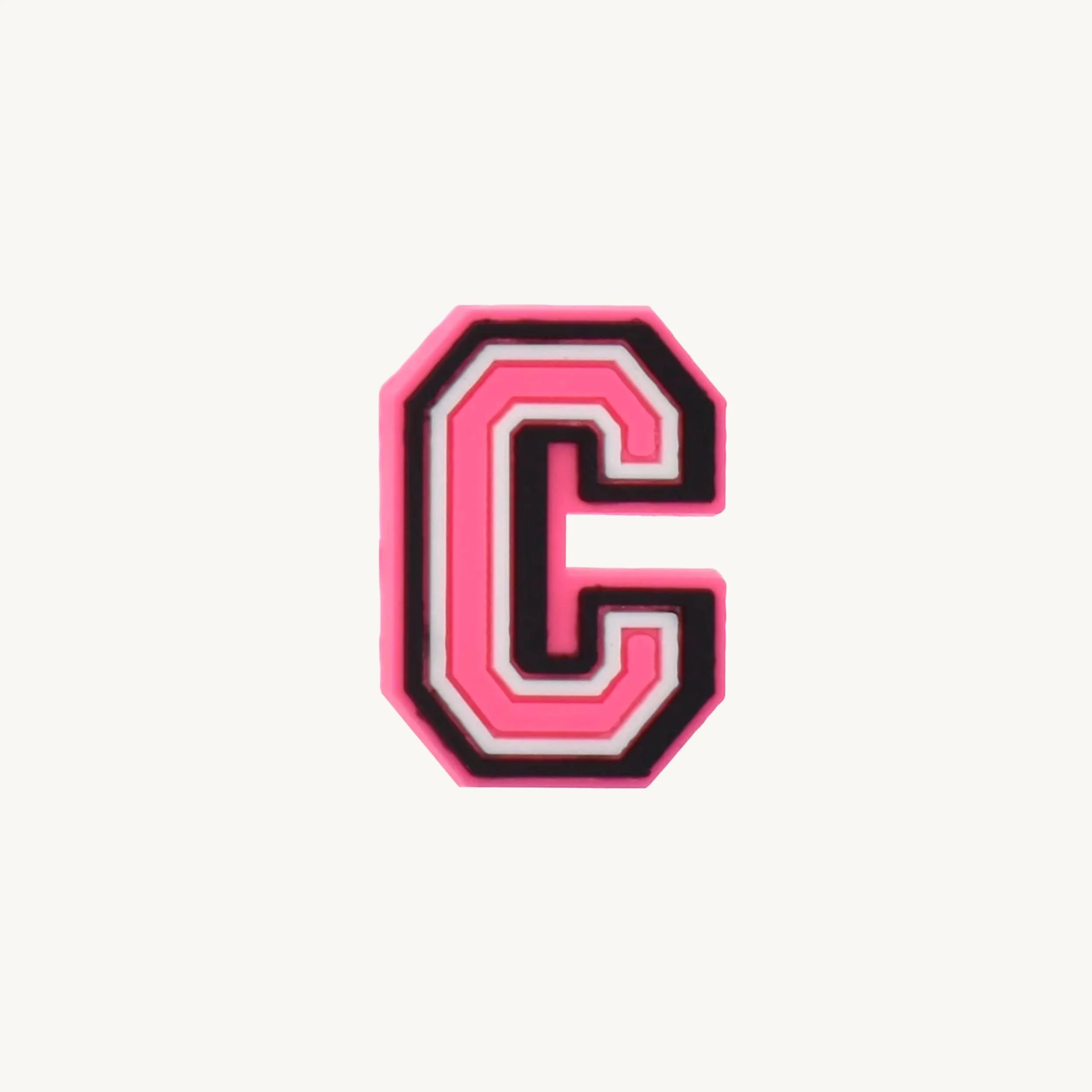 Pink varsity initial letter C charm by CharmyKidz for customizable hair accessories