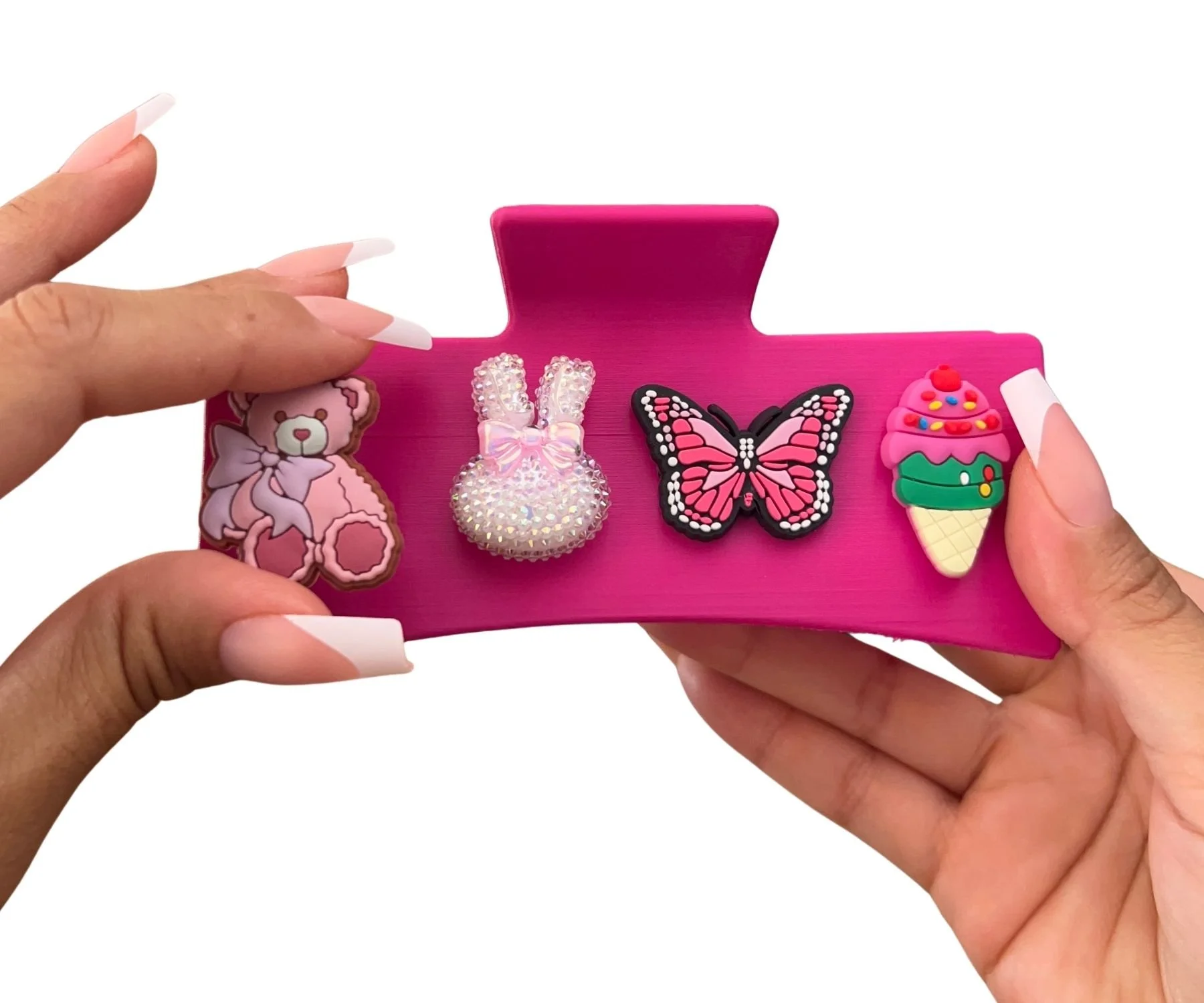 CharmyKidz customizable pink hair claw clip featuring interchangeable snap-on charms.