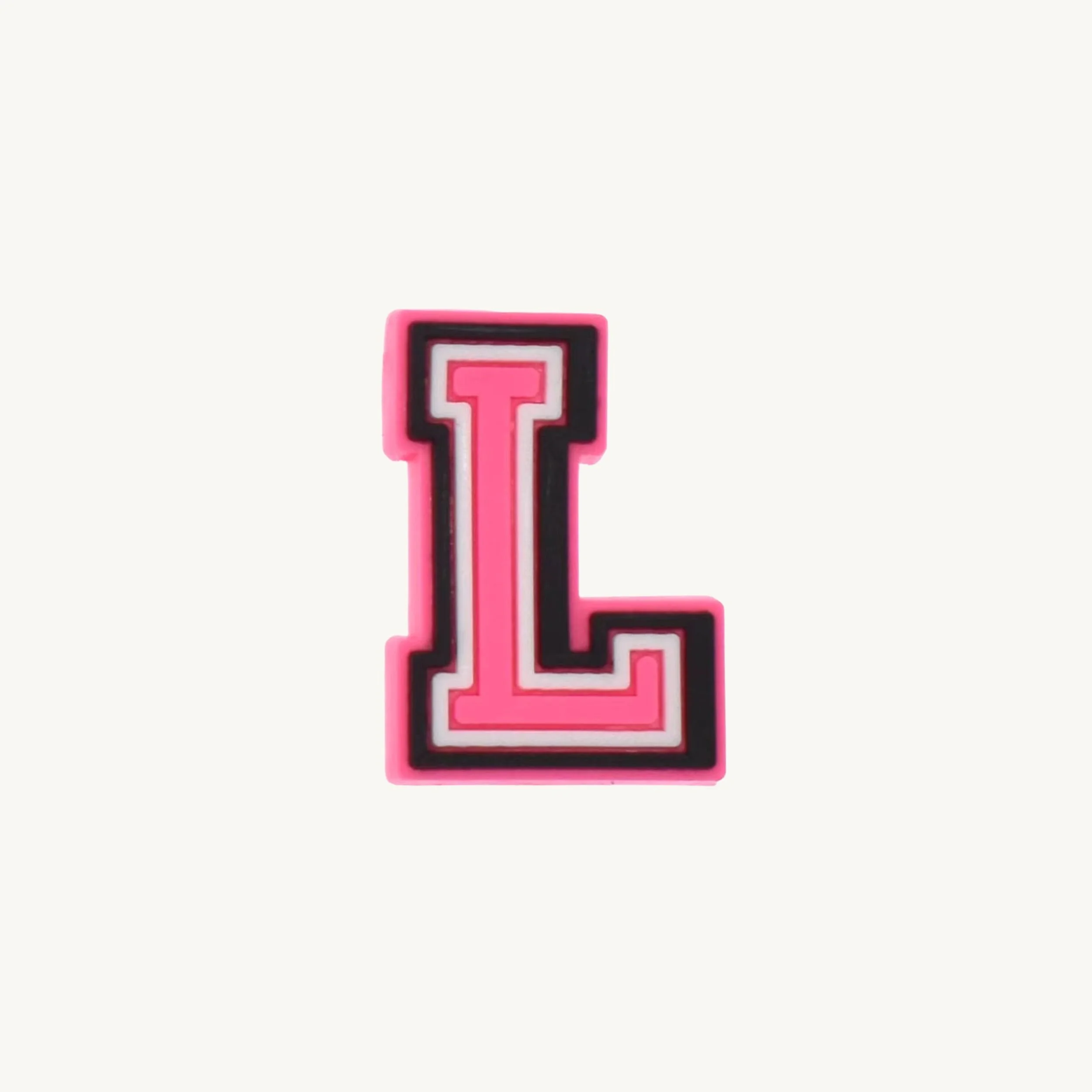 Pink varsity initial letter L charm by CharmyKidz for customizable hair accessories