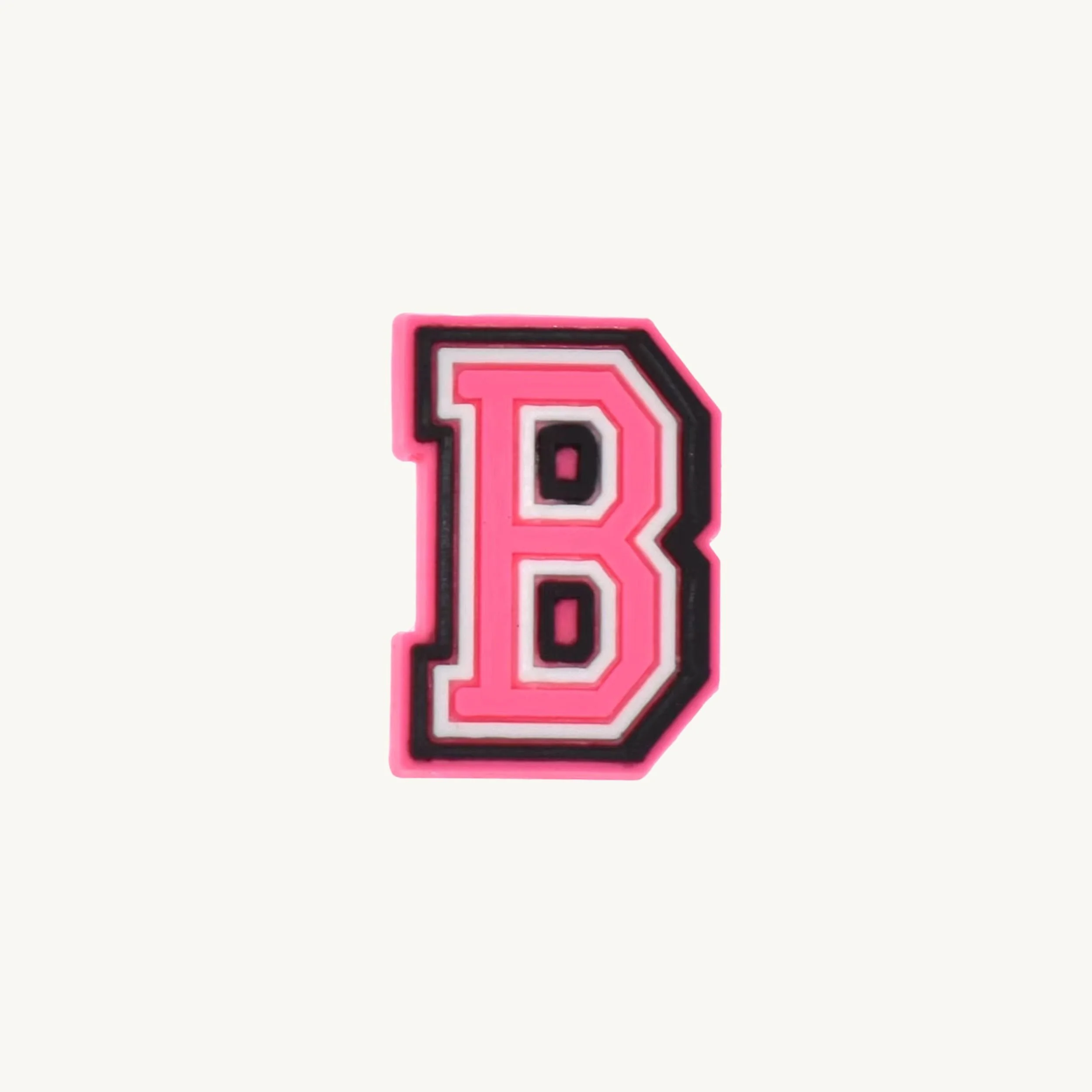Pink varsity initial letter B charm by CharmyKidz for customizable hair accessories