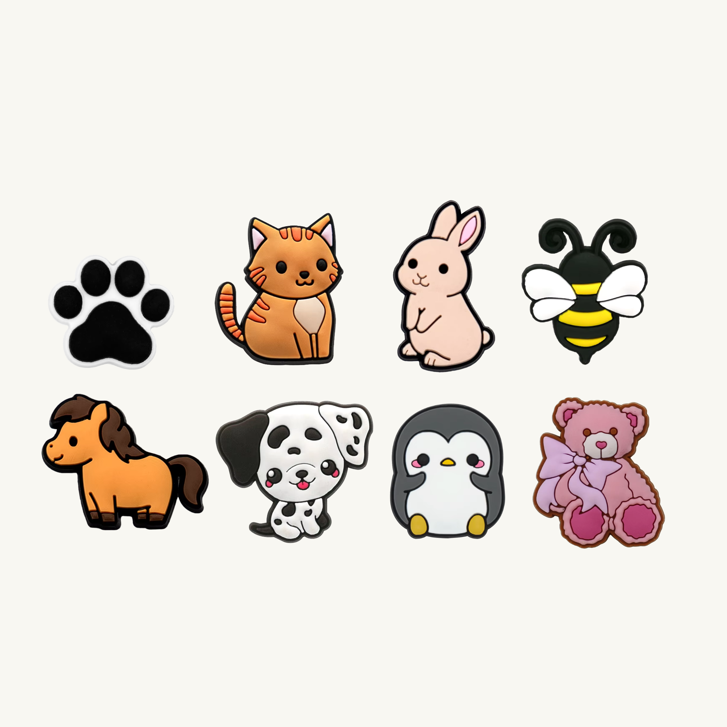 Paw print, tabby cat, bunny, bumblebee, horse, dalmatian, penguin, and teddy bear 8-pack charm set by CharmyKidz for customizable hair accessories
