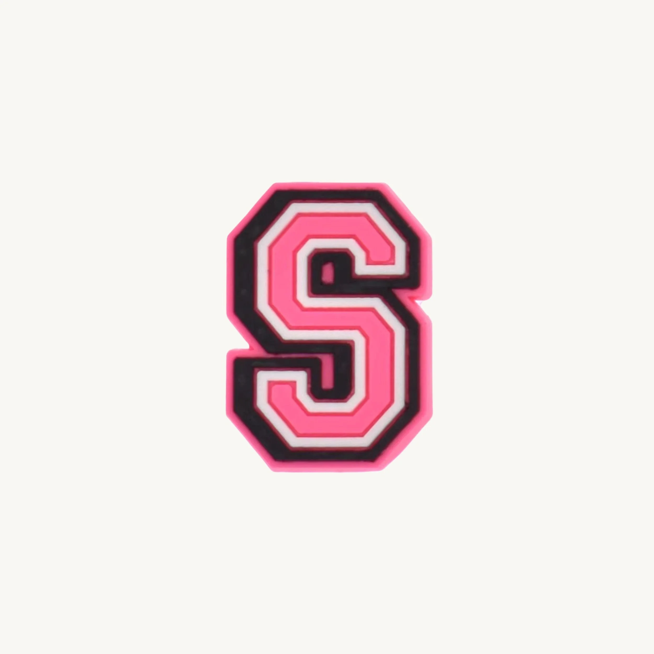 Pink varsity initial letter S charm by CharmyKidz for customizable hair accessories