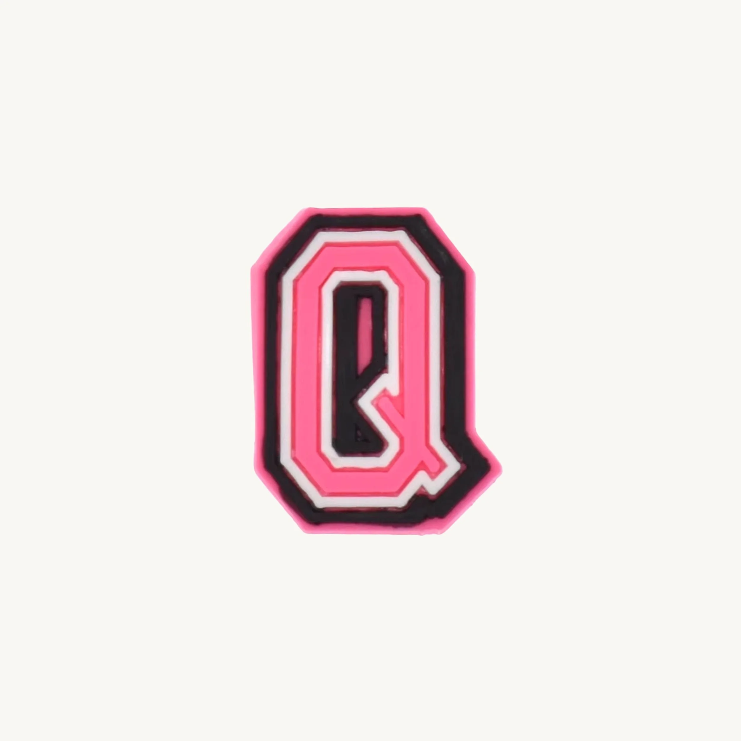 Pink varsity initial letter Q charm by CharmyKidz for customizable hair accessories