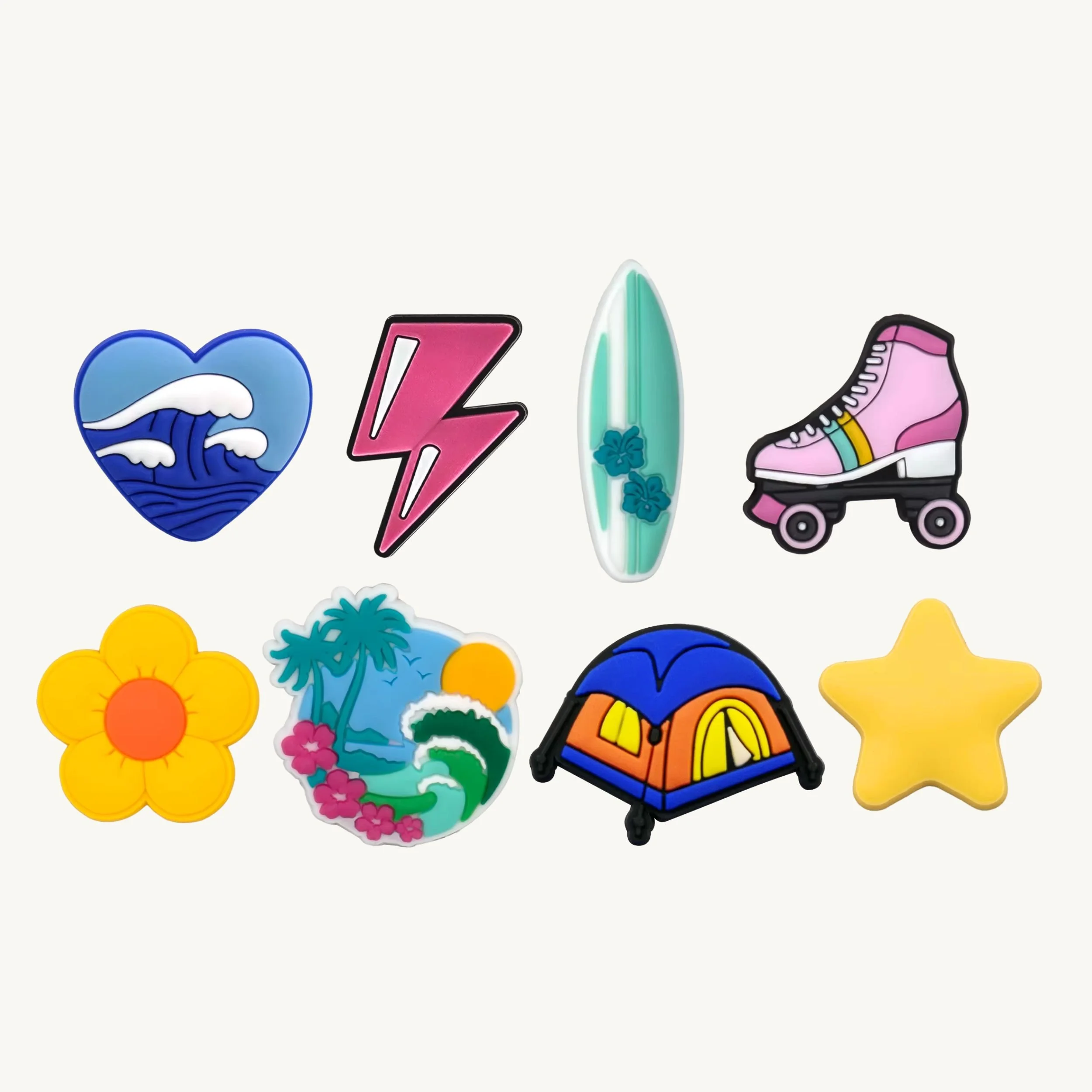 Ocean heart, lightning bolt, surfboard, roller skate, yellow flower, beach waves, camping tent, and star 8-pack charm set by CharmyKidz for customizable hair accessories