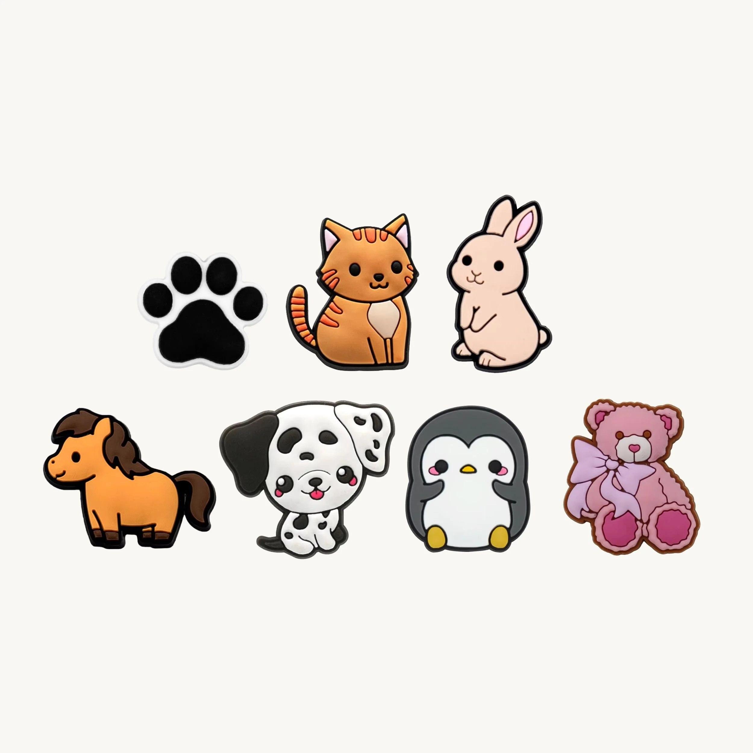 Paw print, cat, bunny, horse, dalmatian, penguin, and teddy bear 7-pack charm set by CharmyKidz for customizable hair accessories