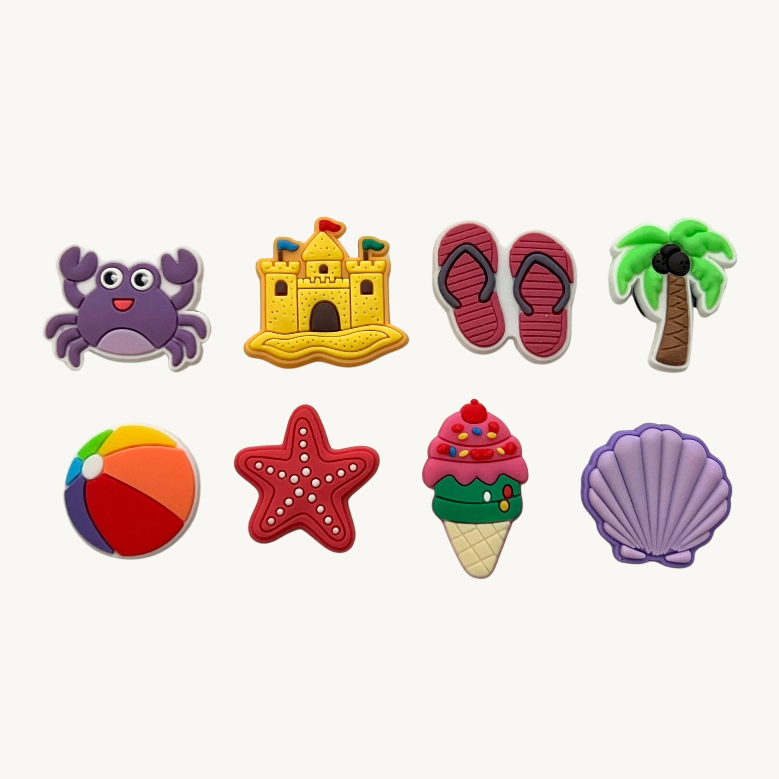 Crab, sandcastle, flip flops, palm tree, beach ball, starfish, ice cream, and seashell 8-pack charm set by CharmyKidz for customizable hair accessories