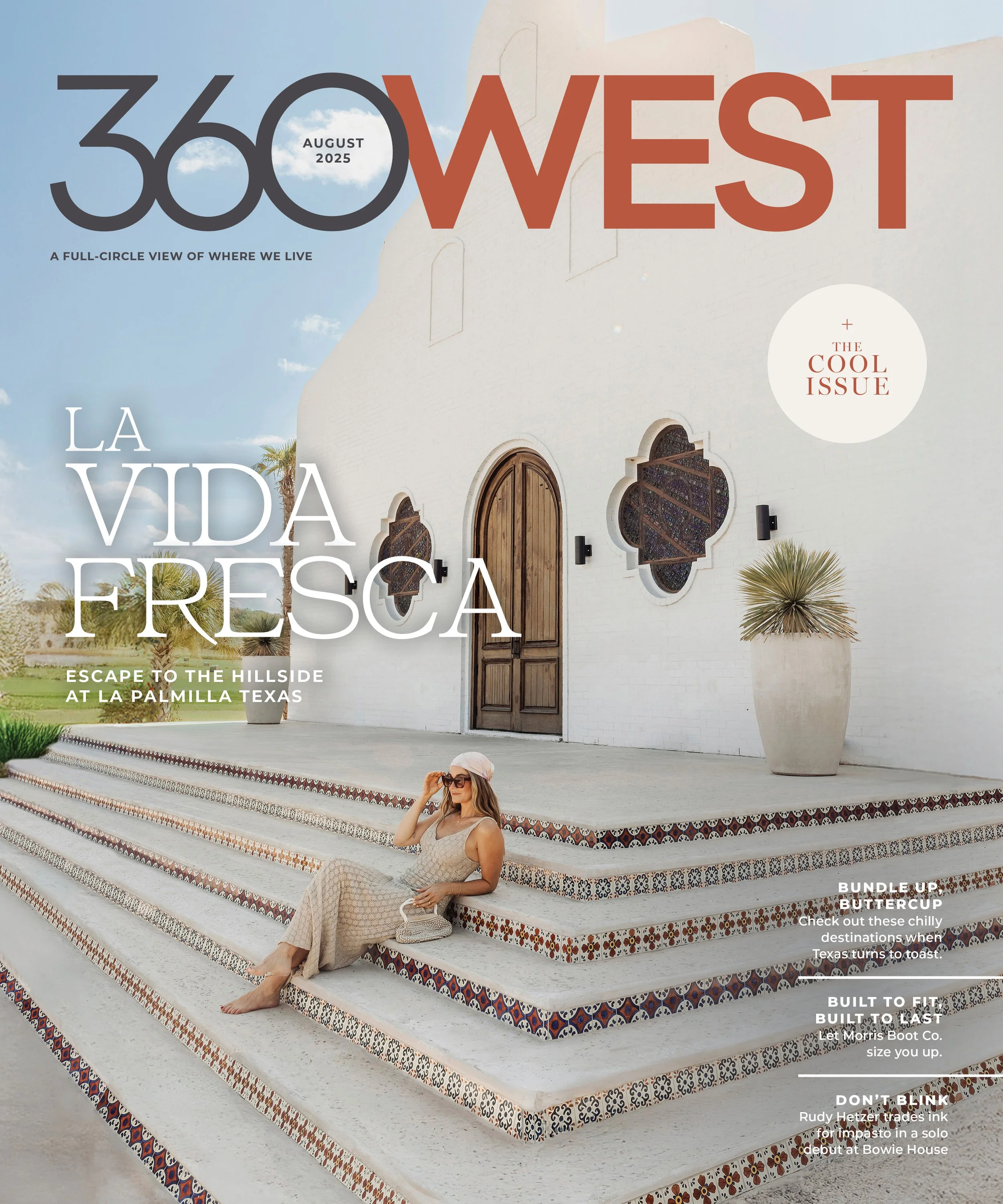 Cover of 360 West magazine August 2025 issue, featuring a woman sitting on steps outside a white building with wooden door and decorative windows, with desert plants nearby.