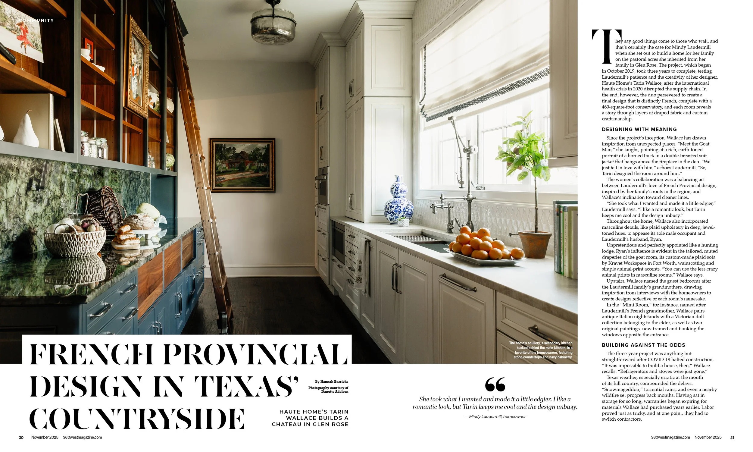 Photo of a kitchen with white cabinets, a large window, and a counter with blue patterned vases and a bowl of oranges. There is a wooden ladder leaning against a dark wood shelving unit filled with decorative items, and a framed landscape painting on