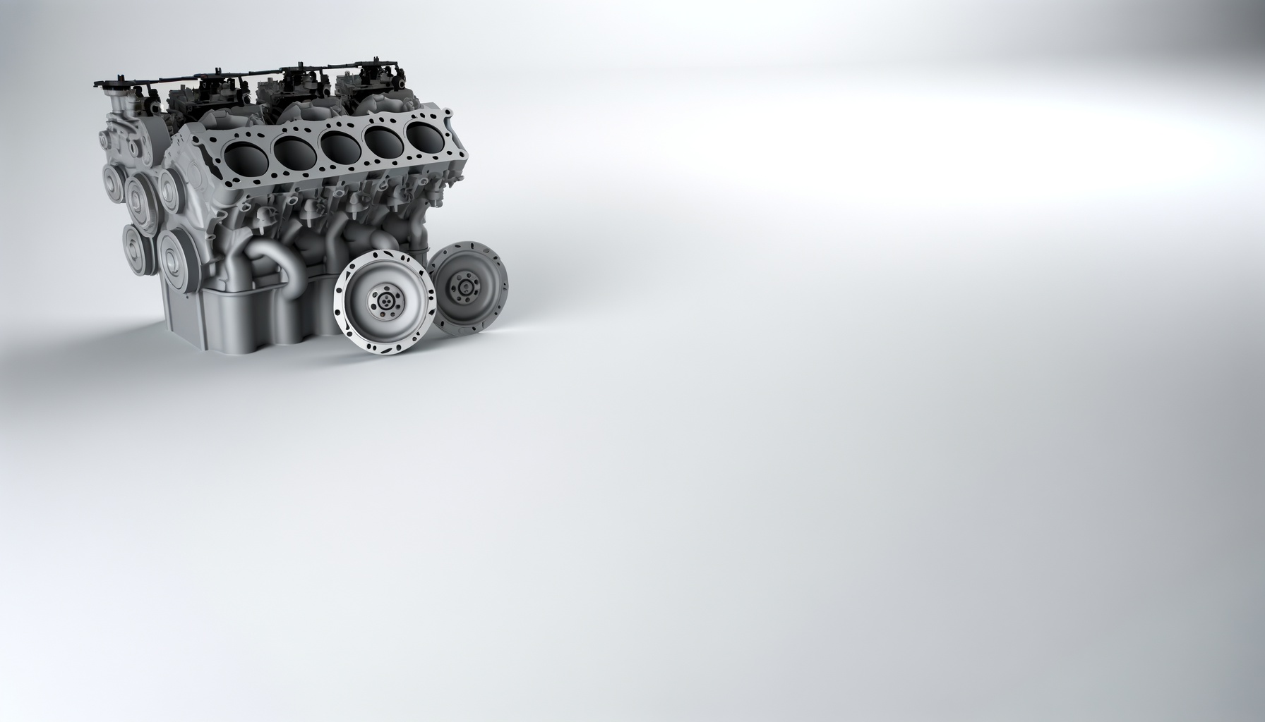 A gray V8 engine block with attached components on a plain background.