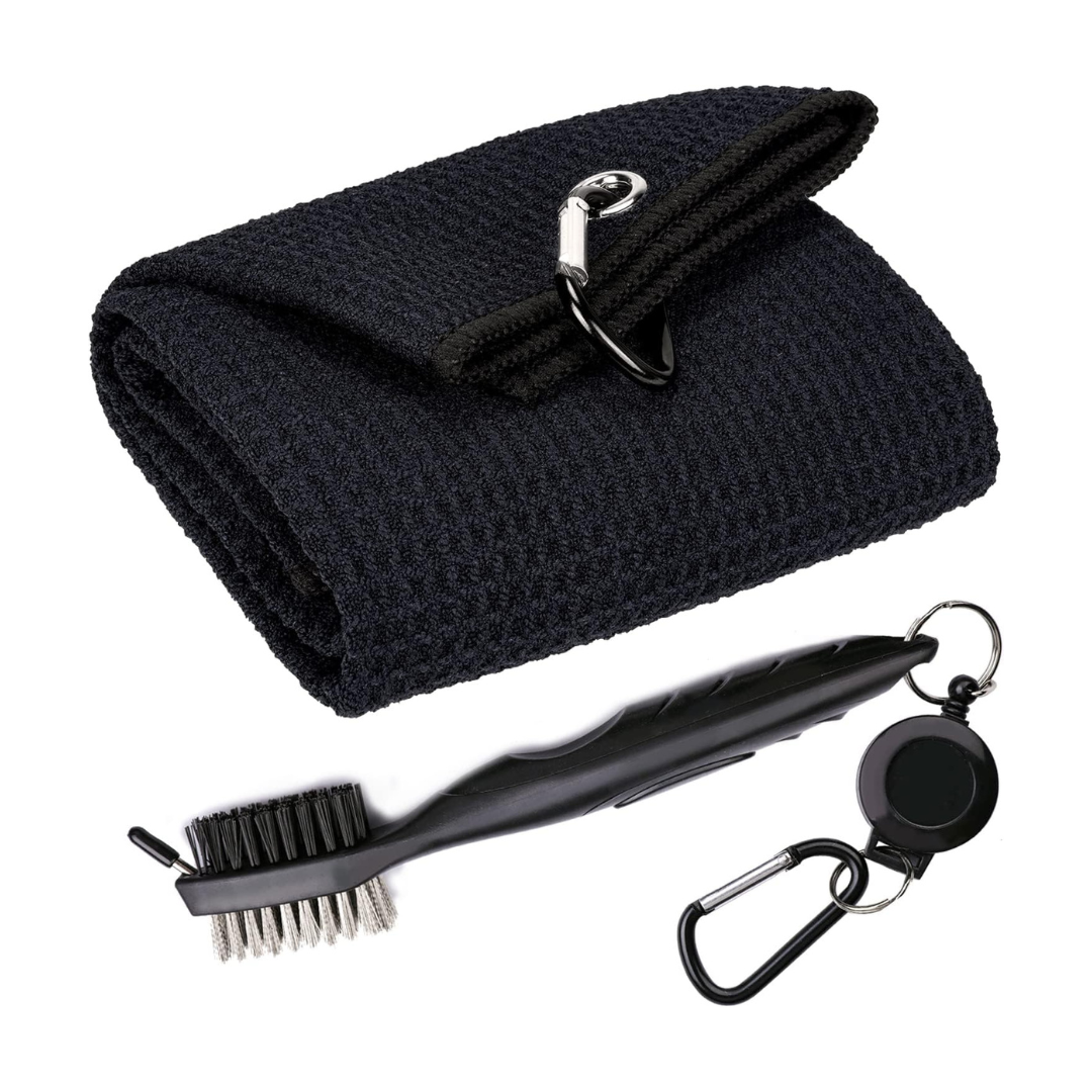 A black microfiber cleaning cloth with a safety pin, a black shoe polish brush with black and white bristles, and a black retractable keychain with a carabiner clip.