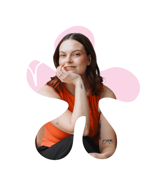 Portrait of a woman with shoulder-length dark hair, wearing a sleeveless orange top, sitting with her chin resting on her hand, surrounded by pink and white doodle-style graphics.