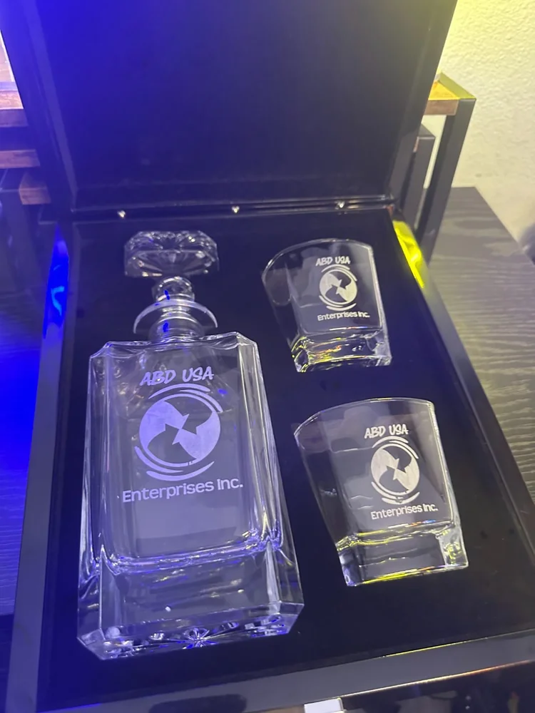 Crystal decanter and glasses engraved with a company logo