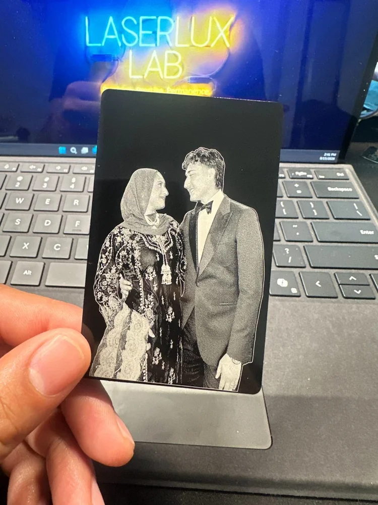 Photograph engraved on a metal card