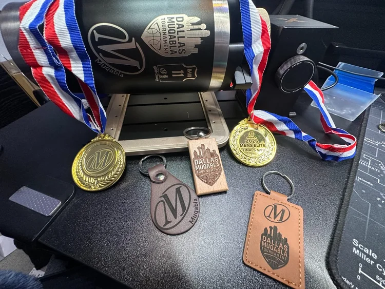 Engraved medals and leather keychains