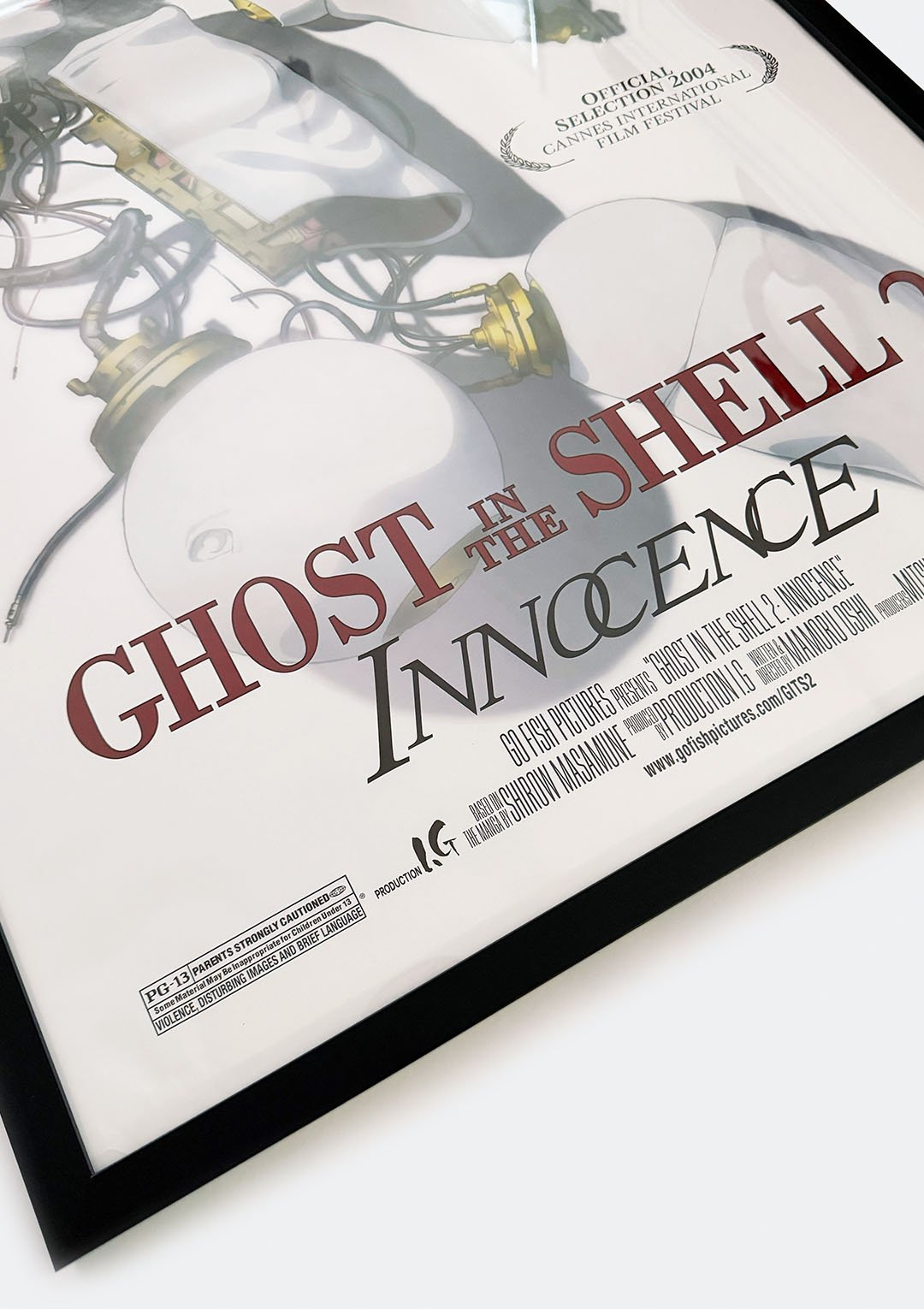ghost_in_the_shell_2_innocence_poster_03.jpg