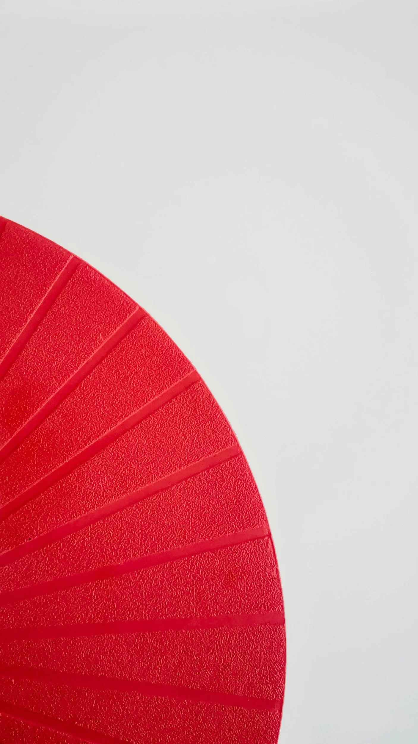 Abstract red decorative design on a client review for Shadan Mosavat counselling.