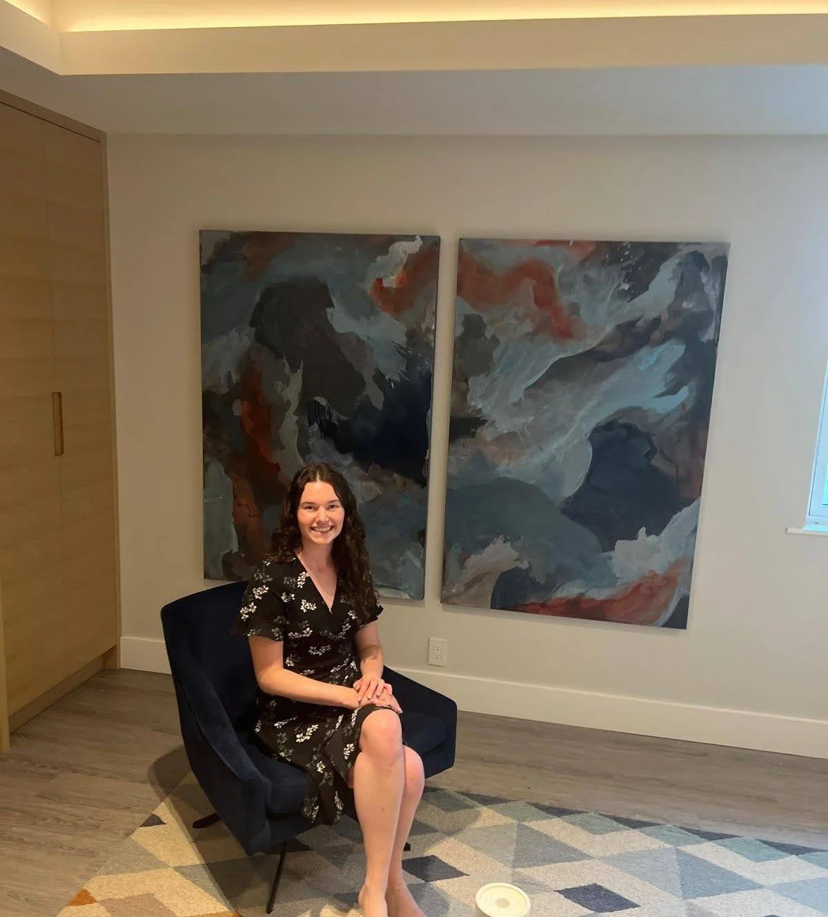 Sierra Rae with one of her commission pieces