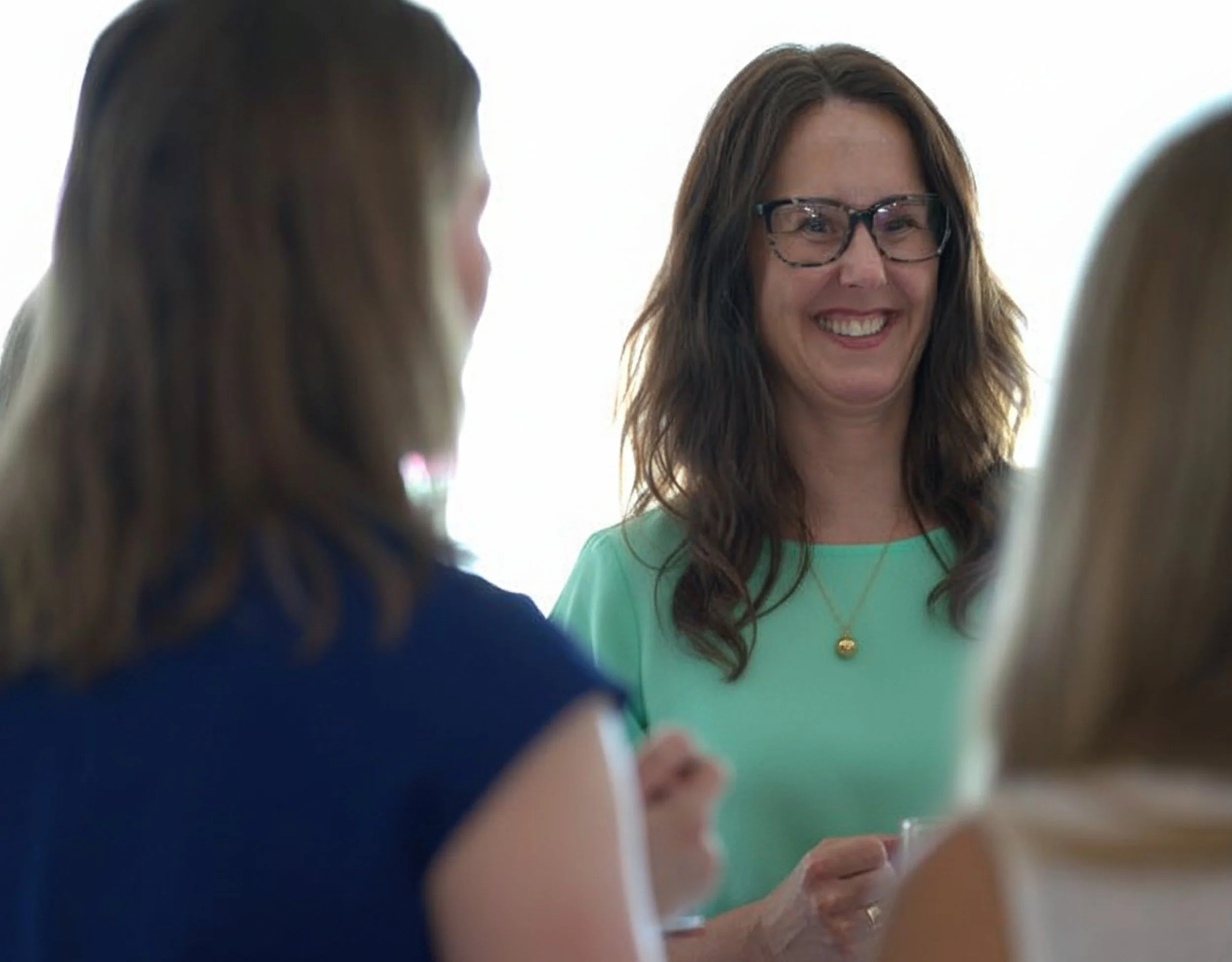 A group of women working as management consultants.