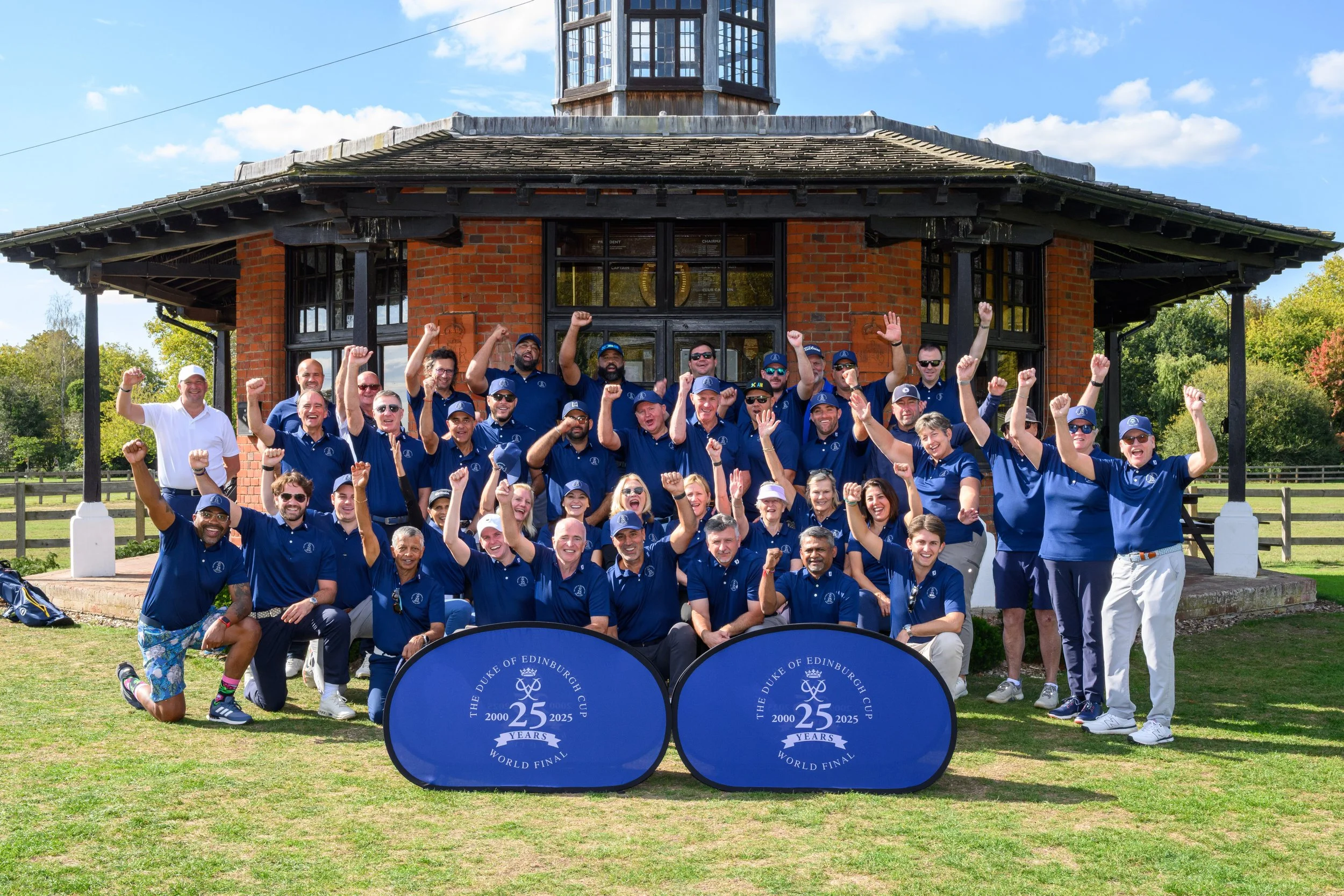 Duke of Edinburgh Cup winners celebrating at golf course pavilion