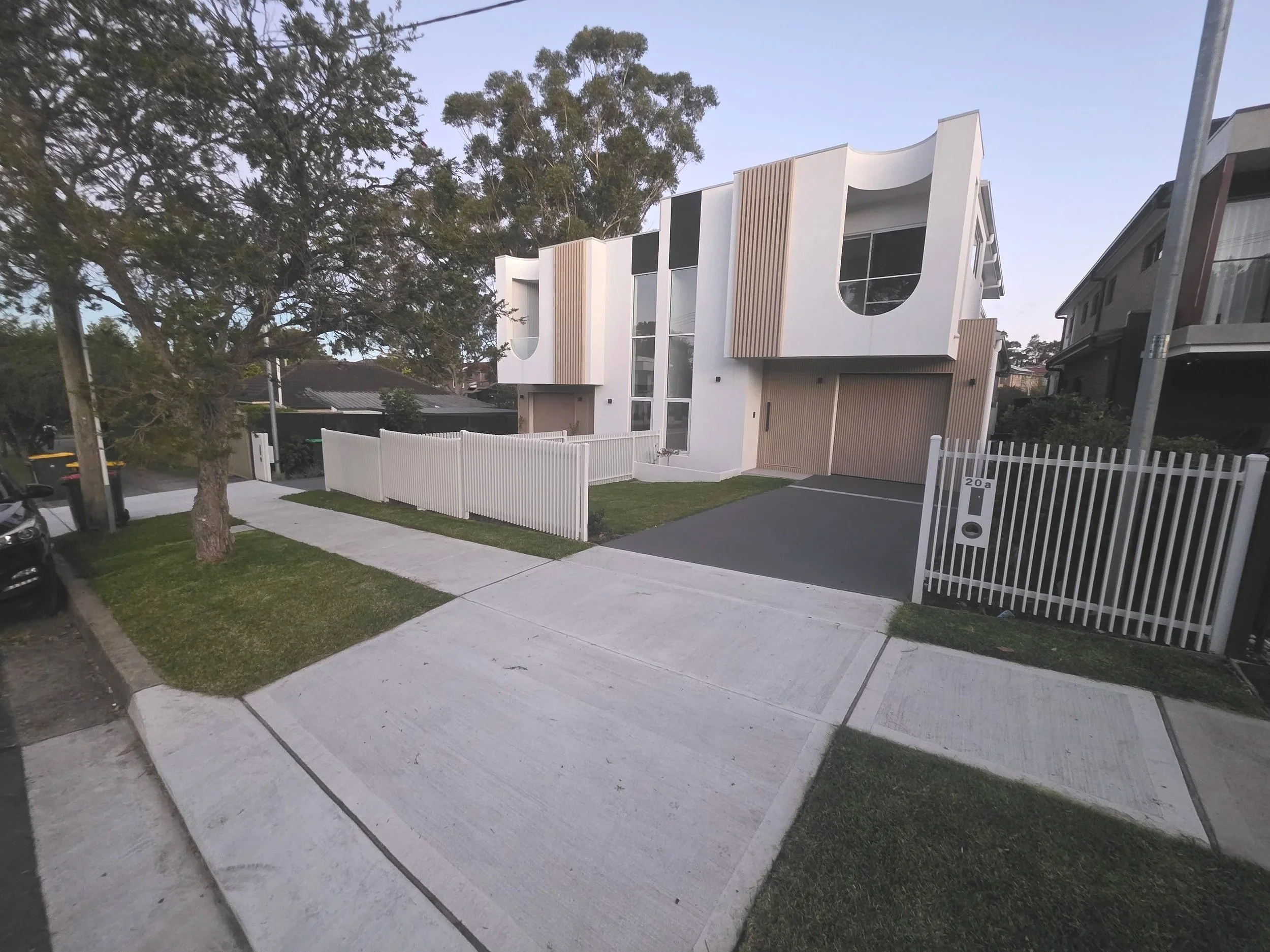 Mowed front lawns Ryde home