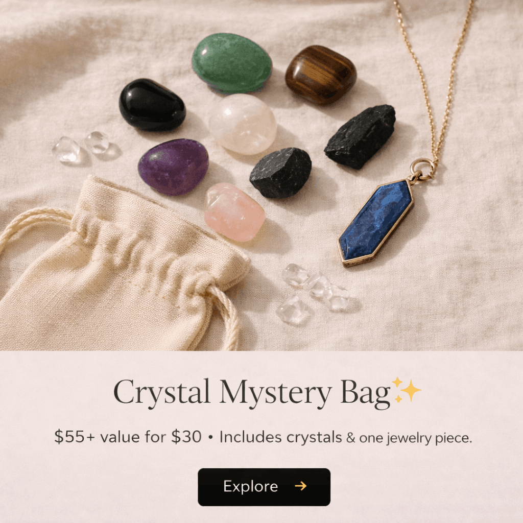 A collection of assorted colorful gemstones and a blue gemstone pendant necklace with a gold chain, surrounded by a small beige drawstring pouch and some clear small crystals, laid on a light fabric surface.