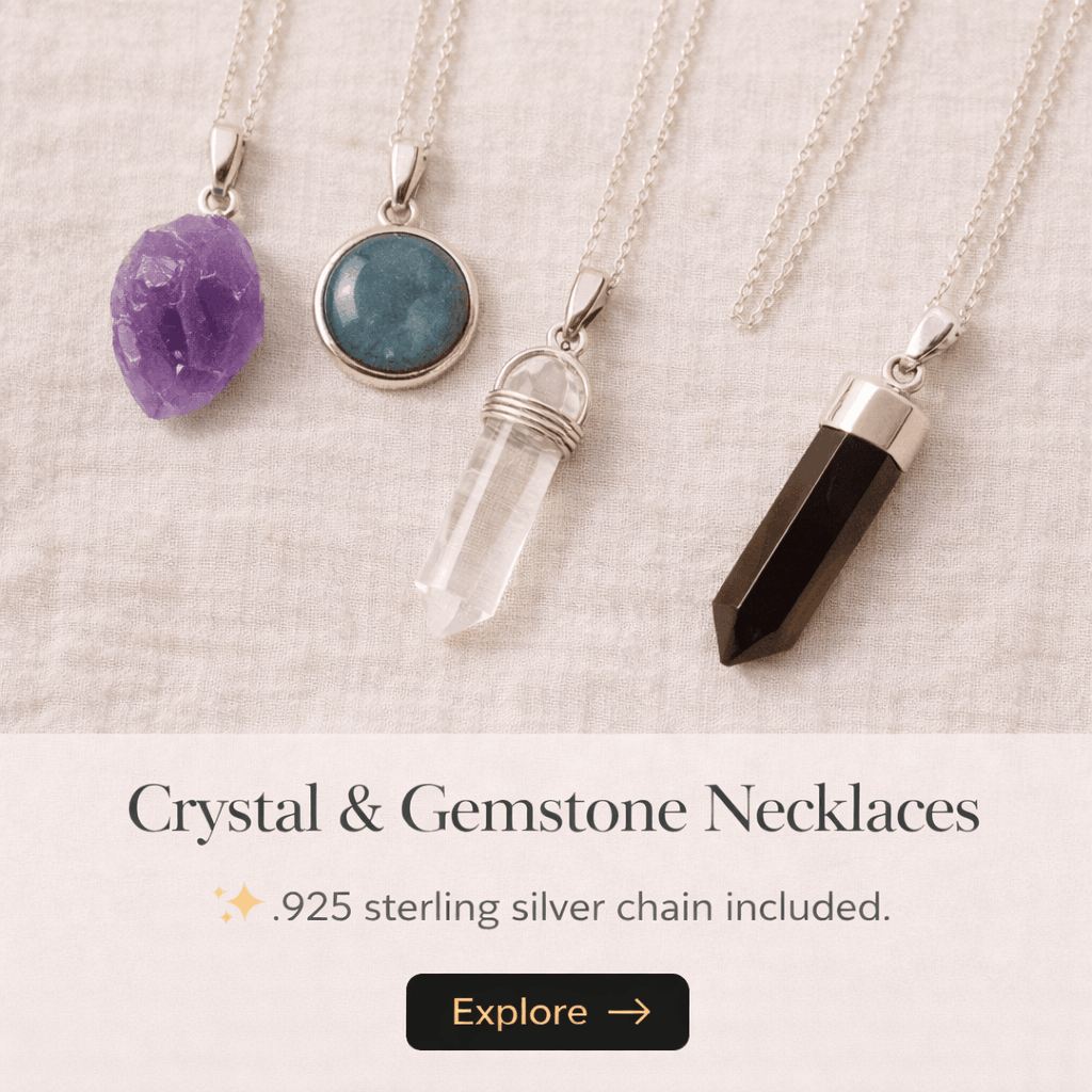 Four crystal and gemstone necklaces displayed on a beige fabric background.