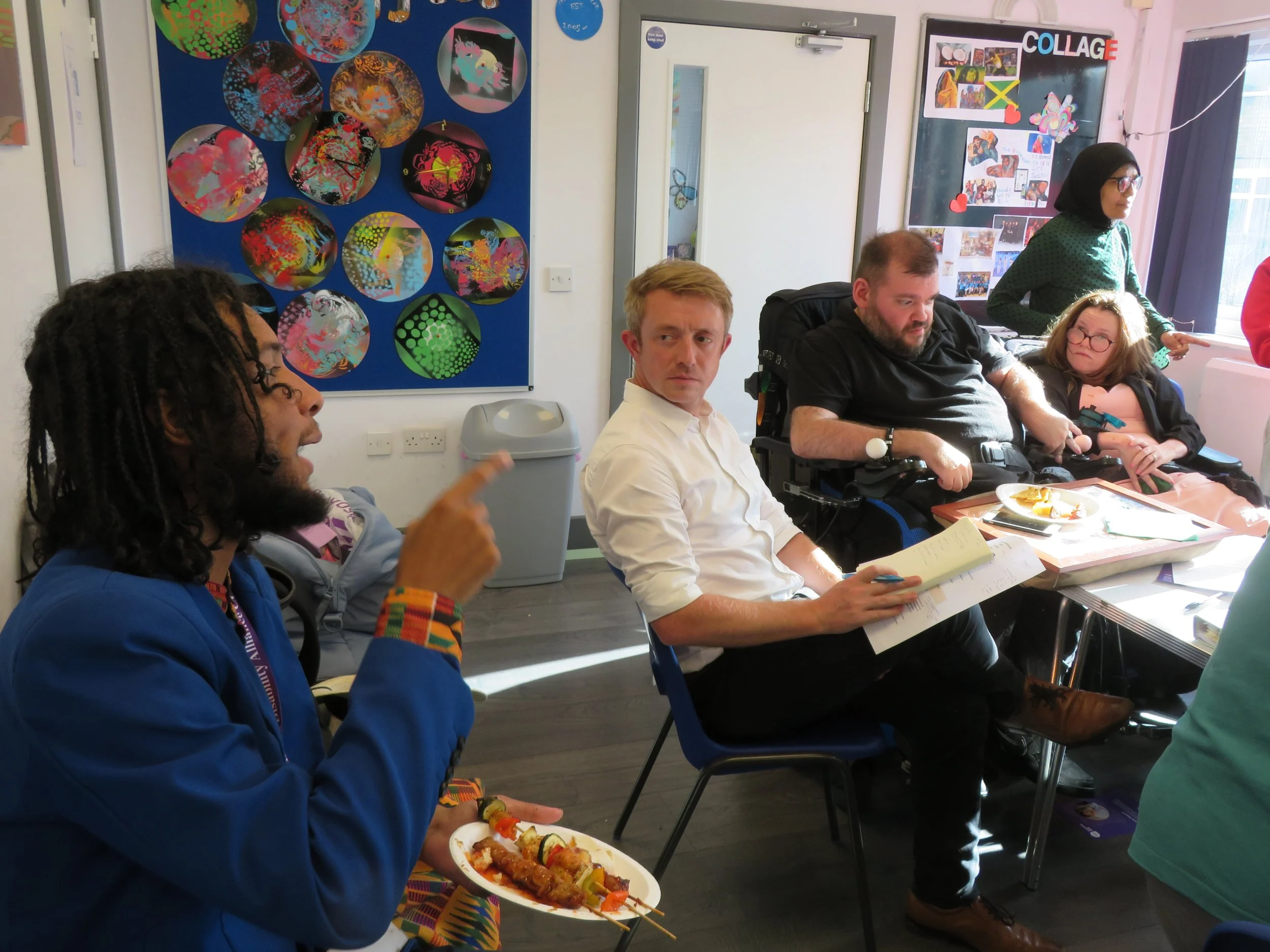 James Mackie from the Casey Commission chats to members of Croydon Mencap and Scott and Katie Peacock Scott