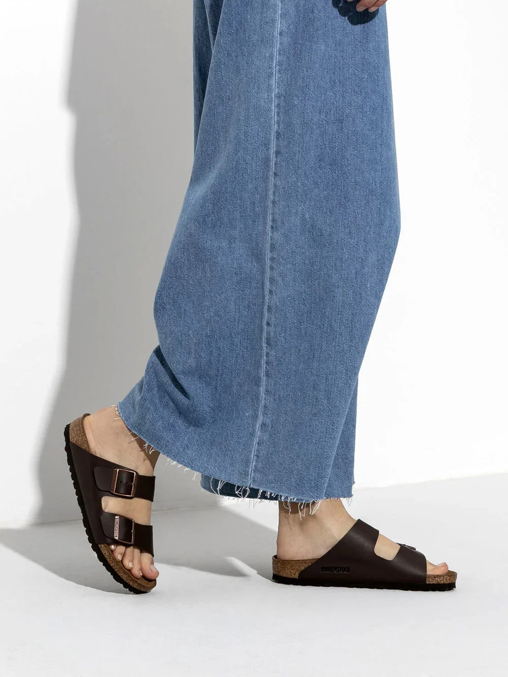 Custom Birkenstock sandals with contoured cork footbed and orthotic modifications, offering arch support, heel relief and diabetic‑friendly fit — expert fittings by registered chiropodist in St. Catharines, Canadian Foot Clinic & Orthotic Centre.