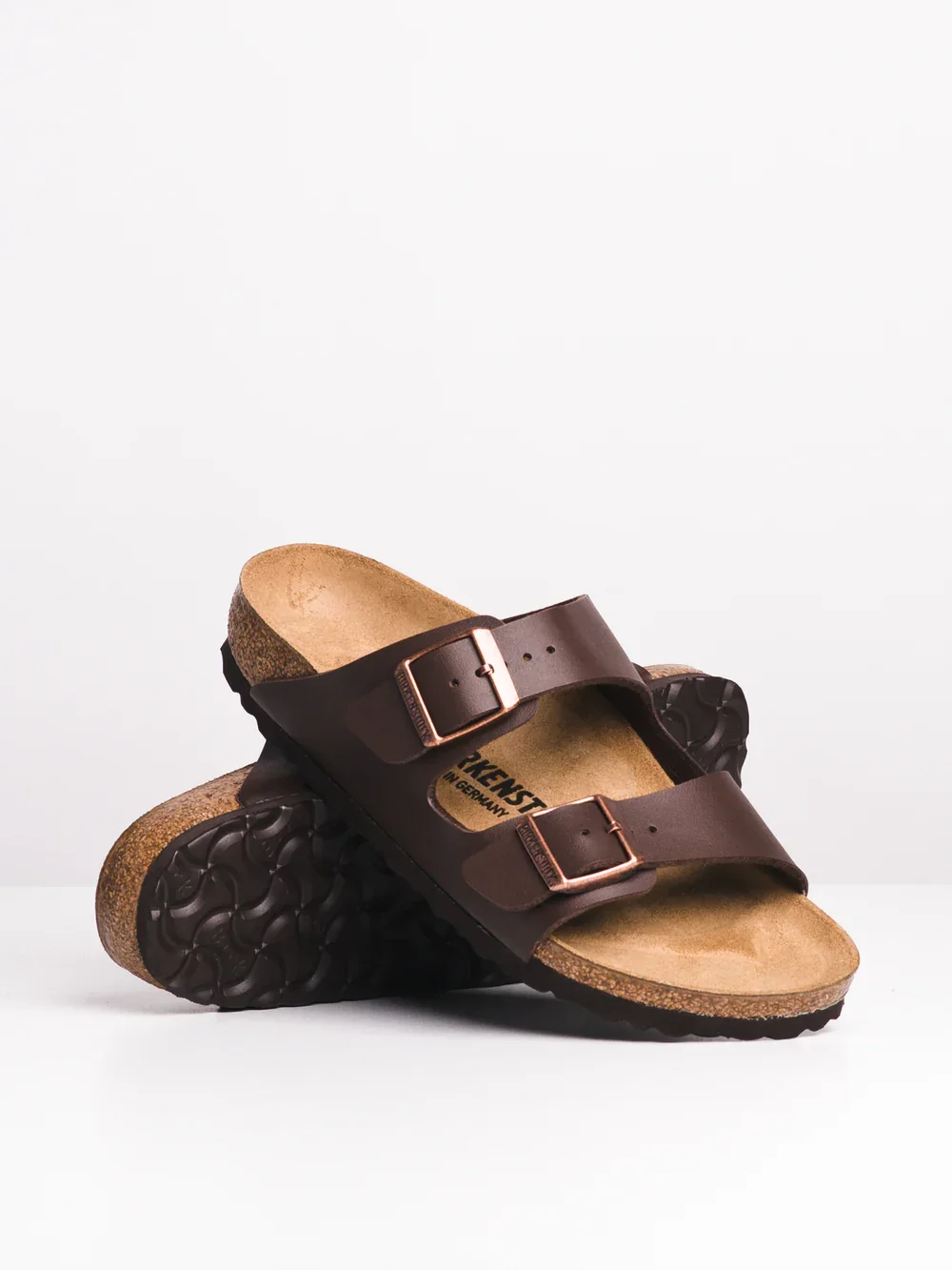 Custom Birkenstock sandals with contoured cork footbed and orthotic modifications — arch support, gait support, diabetic friendly footwear, pain relief by registered chiropodist in St. Catharines, Canadian Foot Clinic & Orthotic Centre.