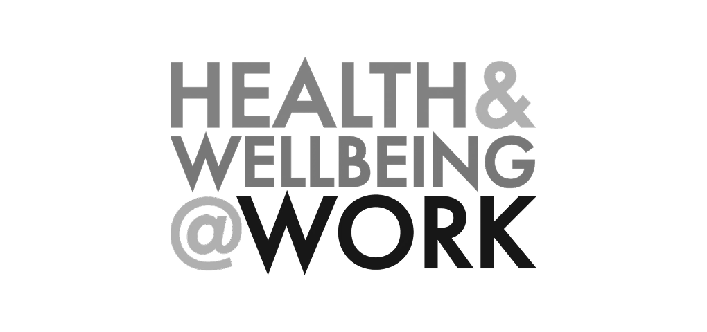 Text that reads 'Health & Wellbeing @ Work' in large, gray and black font on a black background.