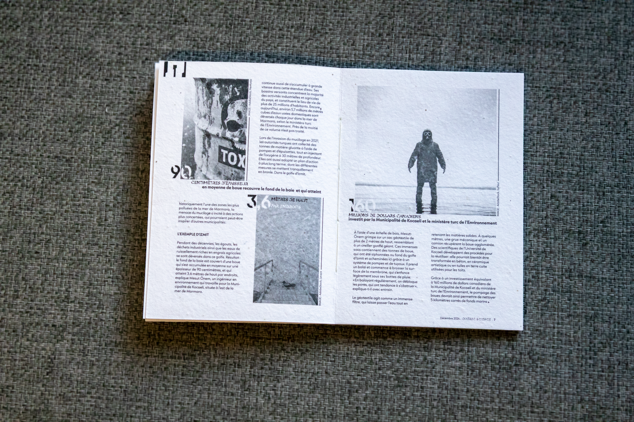 Une page de magazine avec du texte en français et plusieurs images, dont une illustration d'un personnage portant un costume de protection et une photo de bâtiments en ruines. La page présente des articles et des infographies sur l'environnement et l