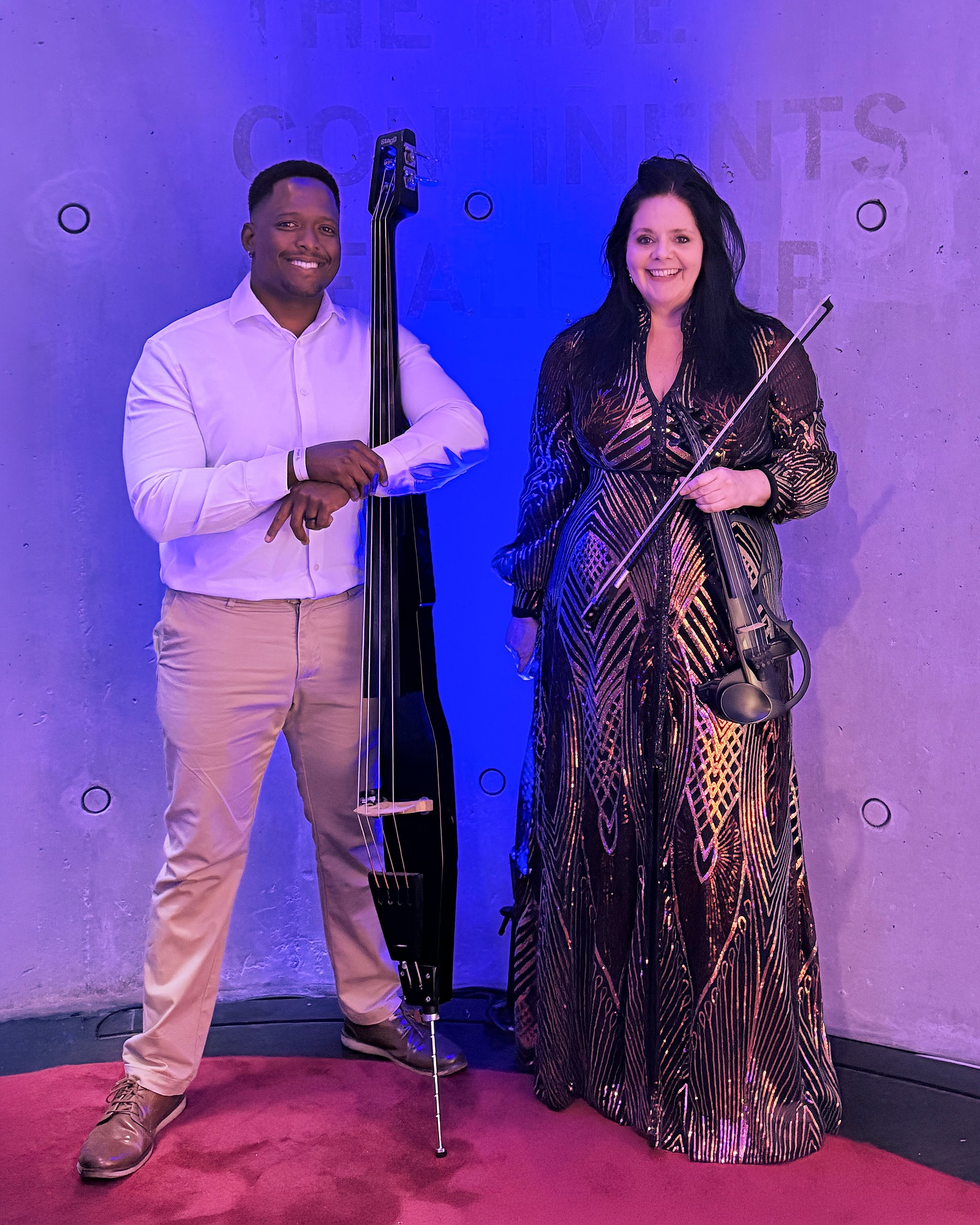 Cape Town Flo, an electric violin and electric bass duo, performing at the Meta 2Africa corporate event at Zeitz MOCAA in Cape Town.