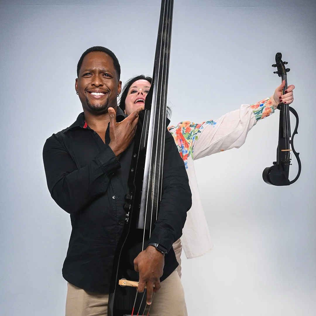 Cape Town Flo, an electric violin and bass duo, performing contemporary African-inspired music for corporate events and luxury functions.