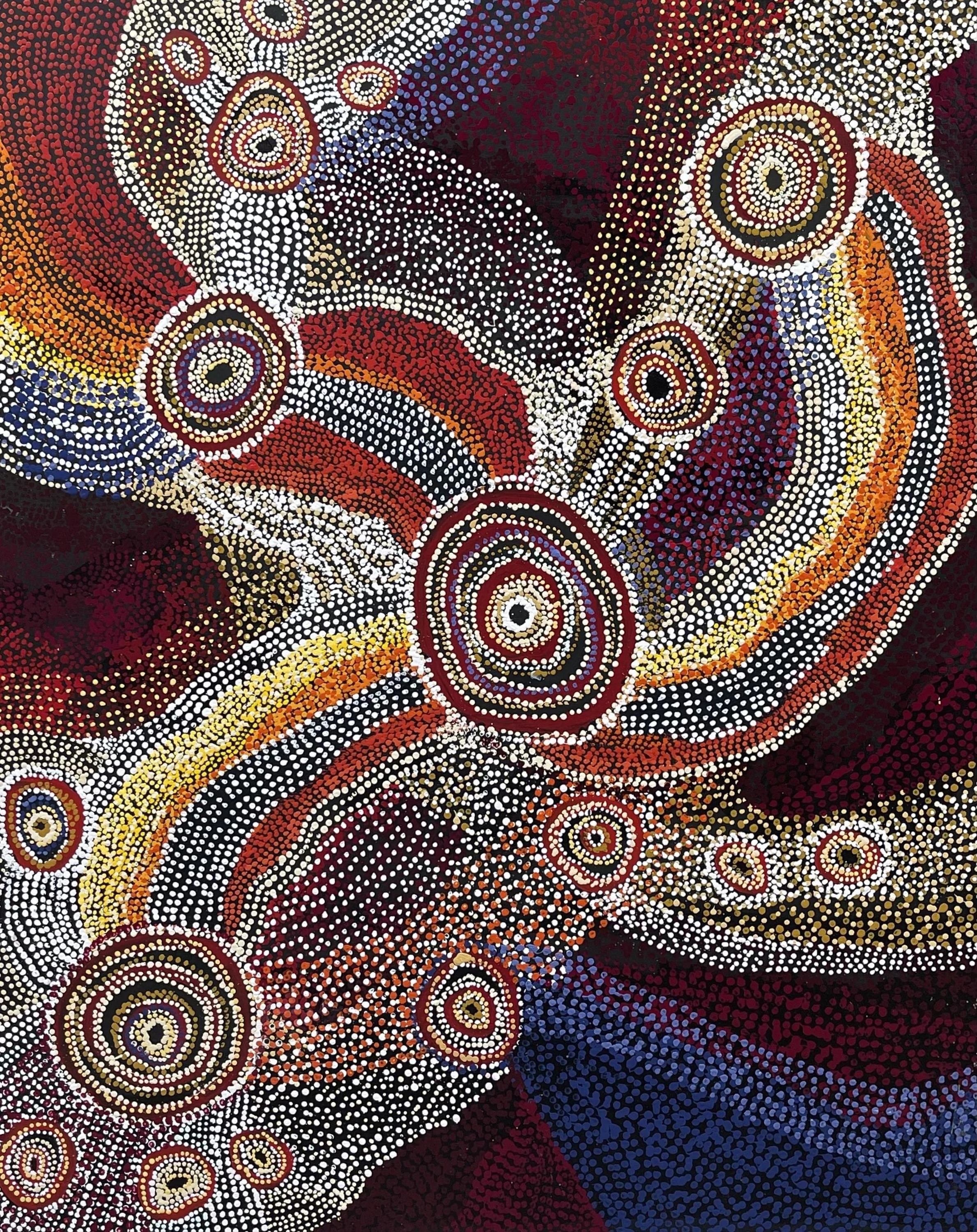 Aboriginal dot painting with concentric circles, lines, and vibrant colors including red, yellow, white, black, and blue.
