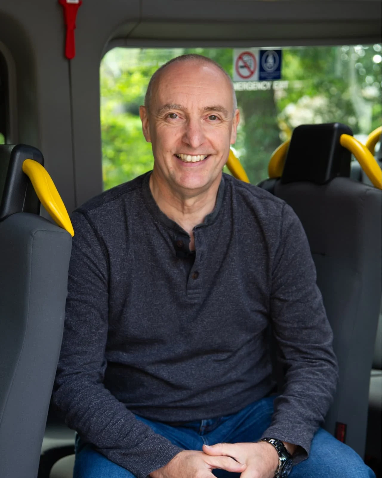 Volunteer driver sitting in an accessible minibus