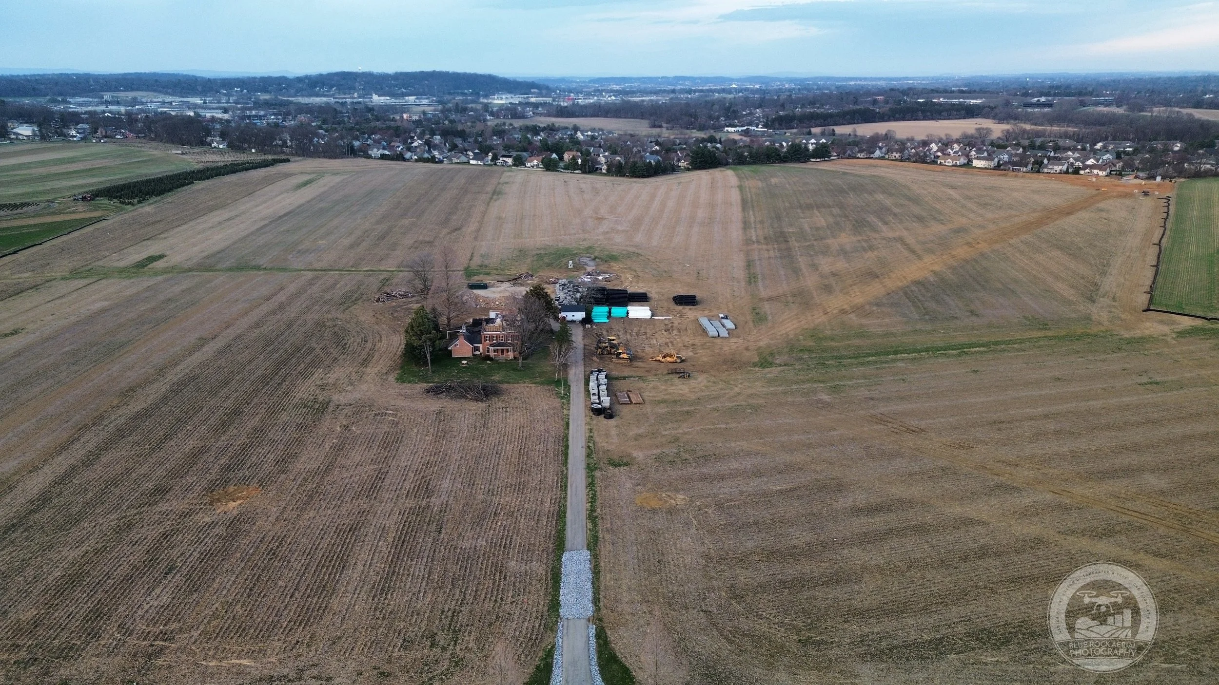 Farmland being prepped to grow houses. 