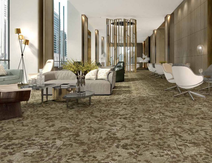 Sol textile Flotex à motifs dans un espace d’accueil, floqué, résistant, acoustique et adapté aux ERP