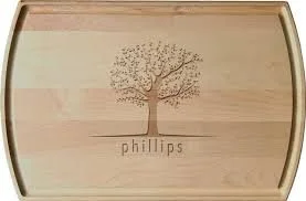 Wooden tray with a tree illustration and the surname 'Phillips' below it.