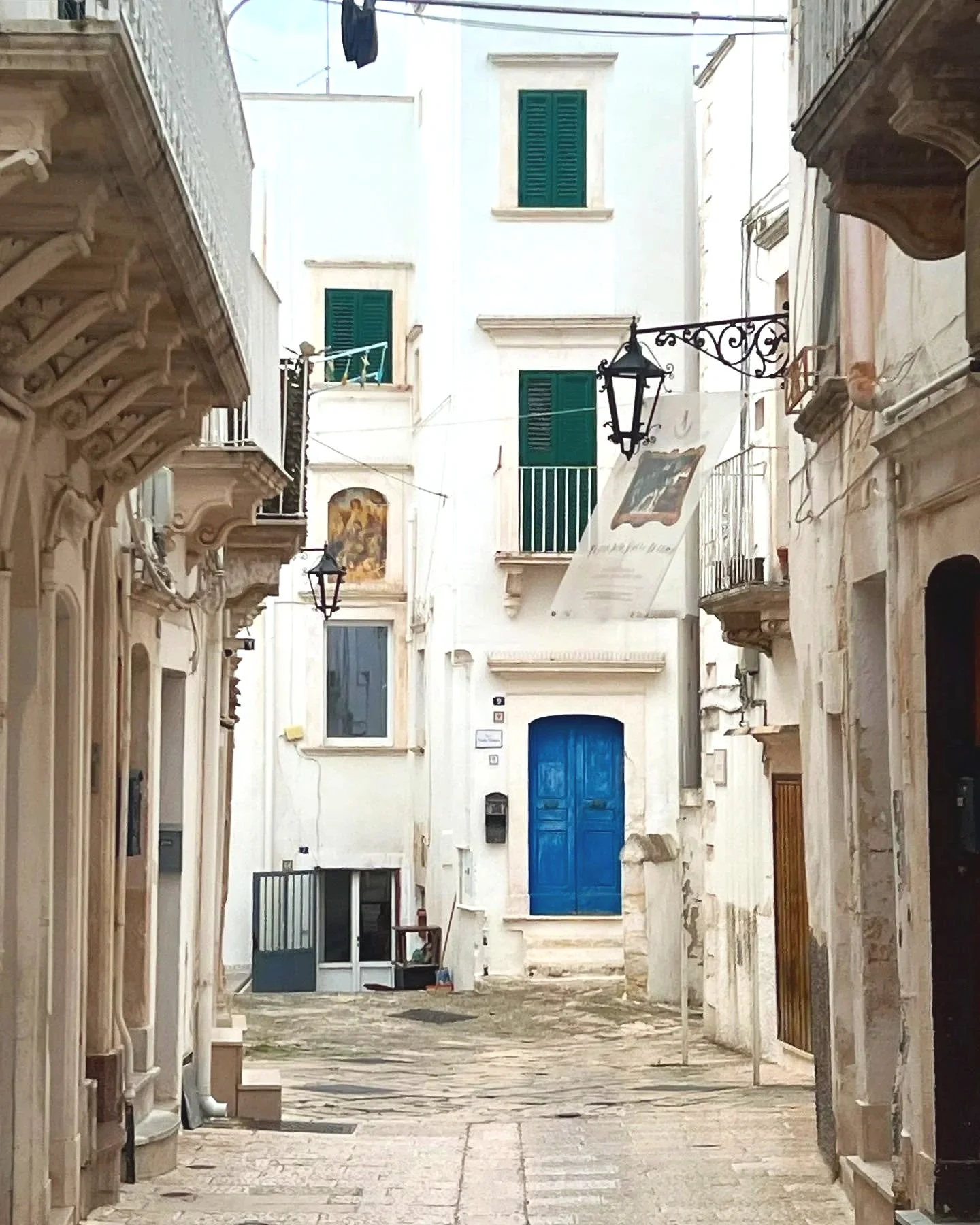 A quiet street in Salento showing everyday life
