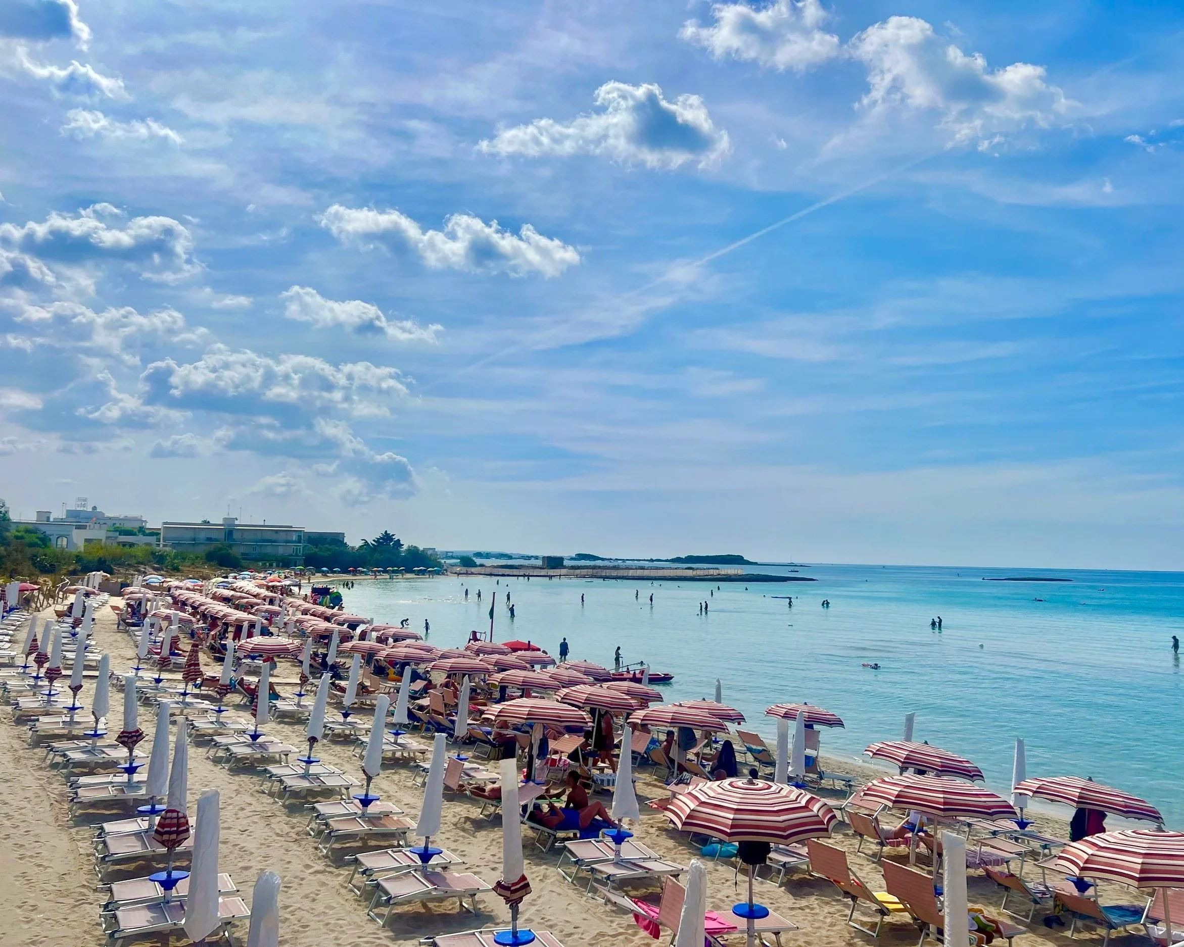 Beach club and seaside views in Torre Lapillo, Salento.