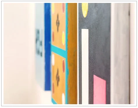 Paintings on the wall of the Red Barn Gallery by Charles Thomas O'Neil.