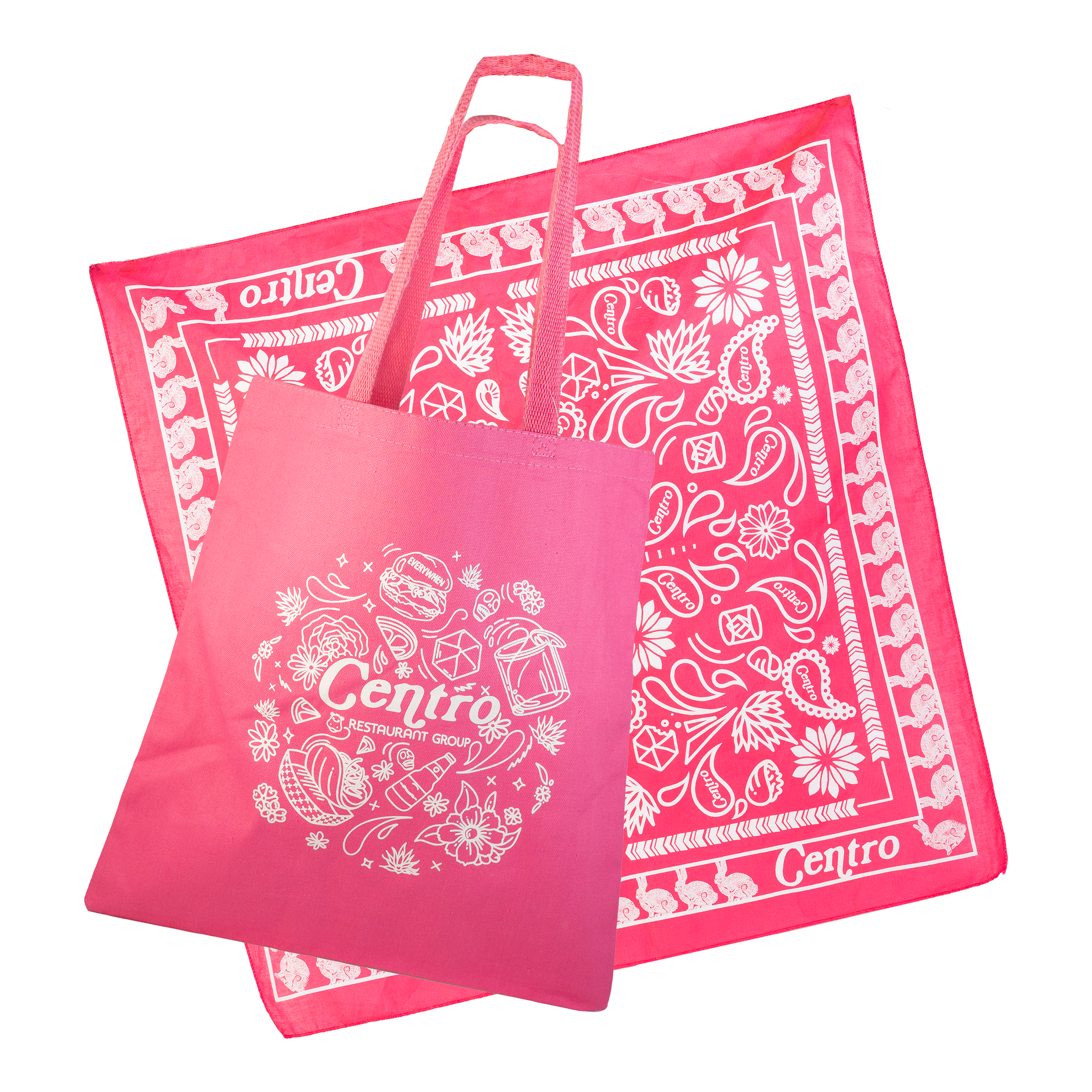 Pink tote bag with white logo of Centro Restaurant Group and decorative floral and food illustrations, in front of a pink bandana with a similar white pattern.