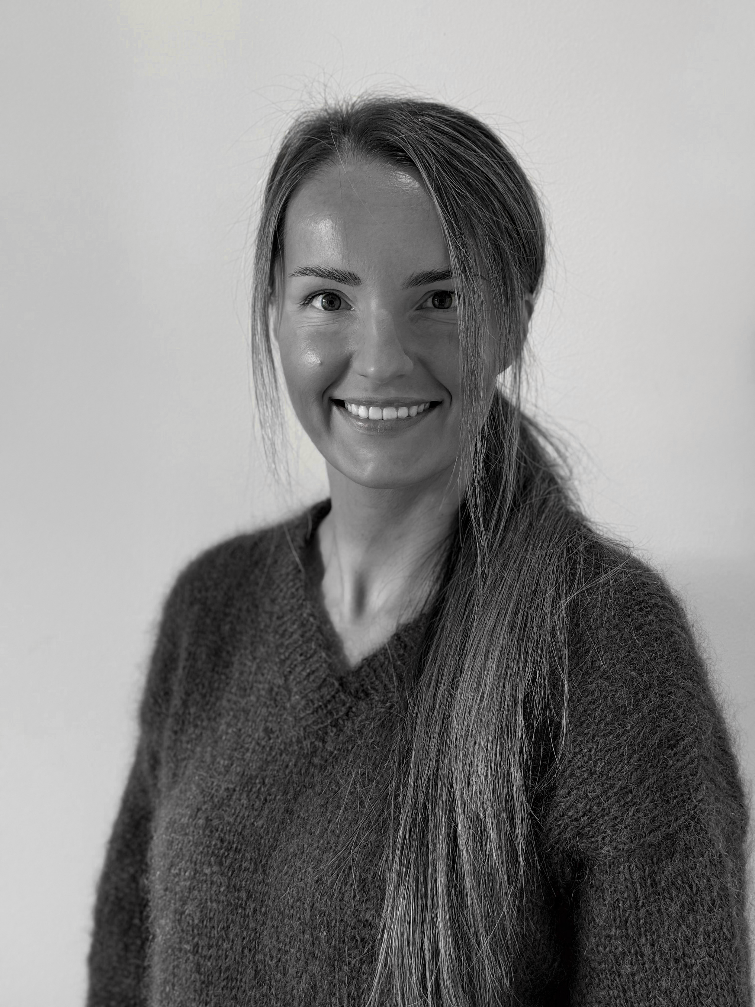 Svart-hvitt portrett av Dorota Nielsen, arkitekt i Oculus Arkitektur.